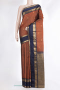 Pure Silk Rust Kanjivaram Saree with Checked design on the body and Zari Border.  displayed on a mannequin