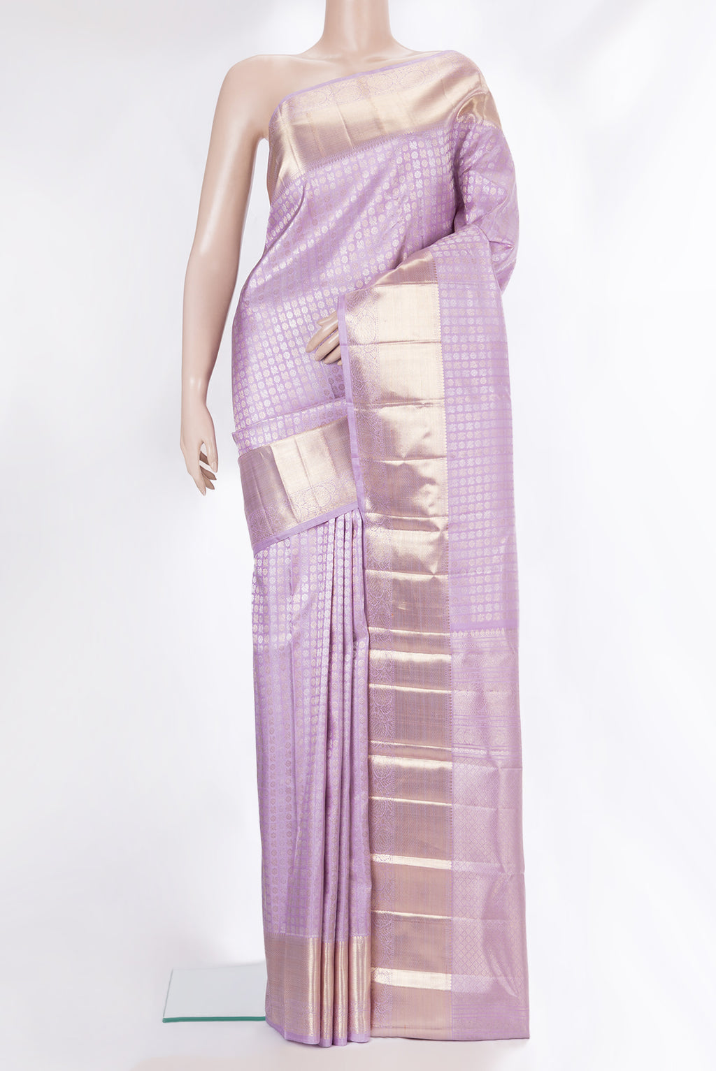 Pure Silk Lavender Kanchipuram Saree with Zari Brocade on the body and Zari Border.  displayed on a mannequin