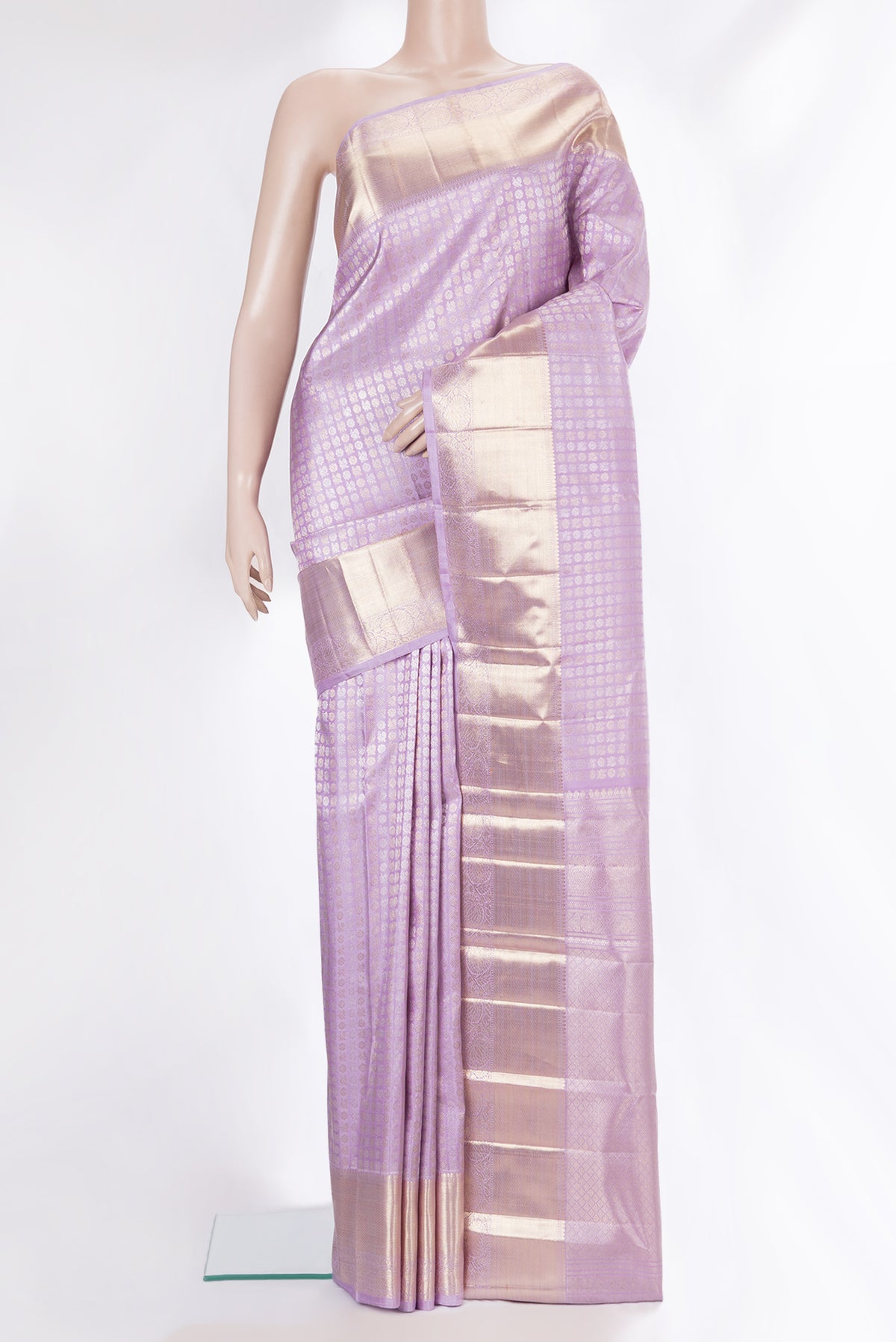 Pure Silk Lavender Kanchipuram Saree with Zari Brocade on the body and Zari Border.  displayed on a mannequin