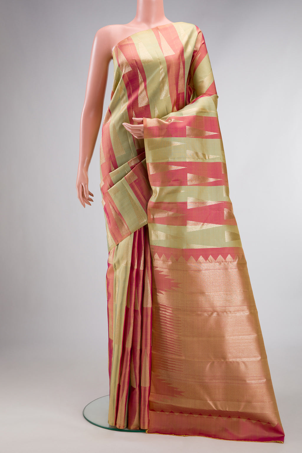 Pure Silk Coral  and Pista Green Color Kanchipuram Saree with Zari Brocade on the body and Without Border.  displayed on a mannequin