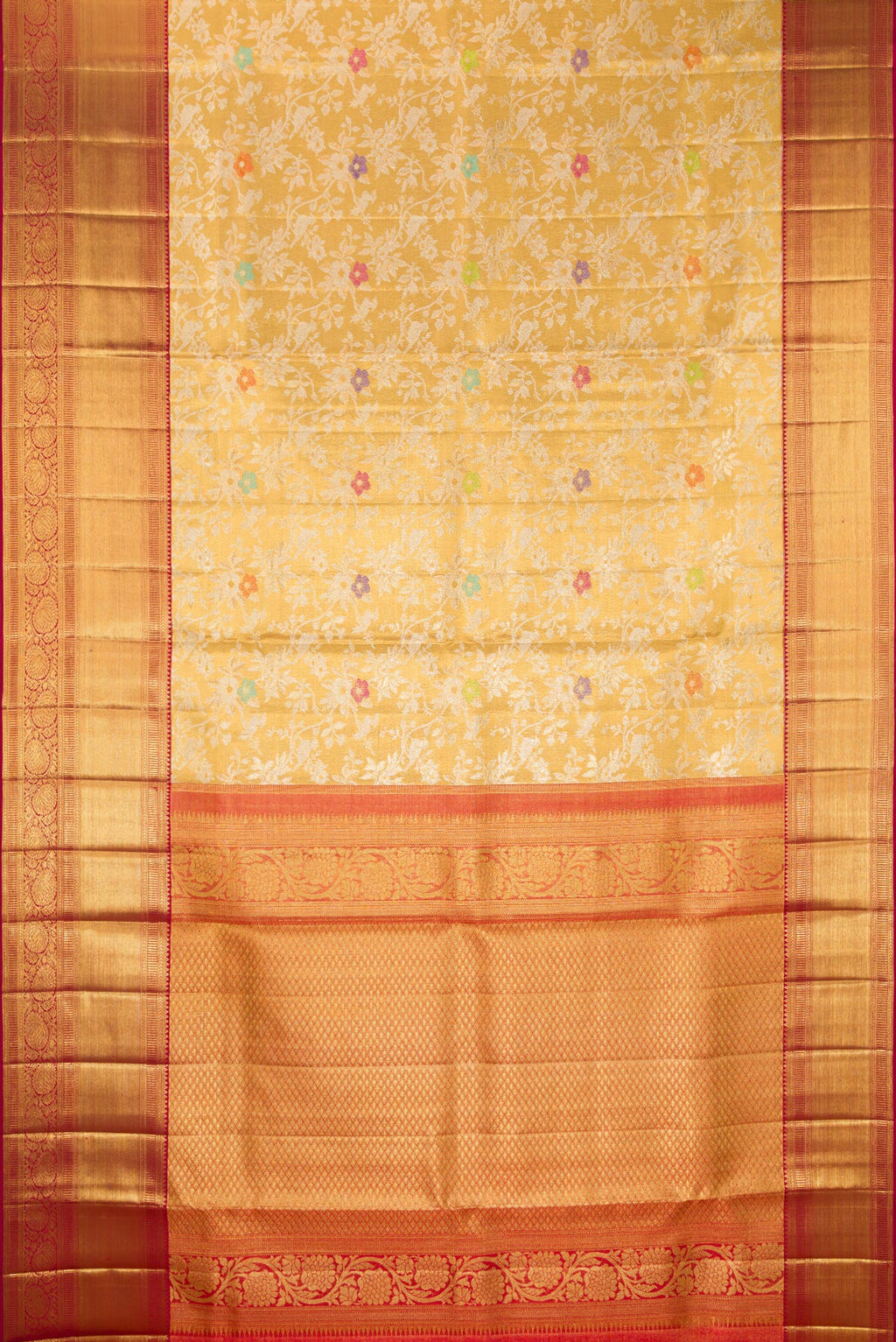 Flat view of Gold Dual Tone Kanjivaram Tissue Saree with Zari Brocade on the body and Zari Border. 
