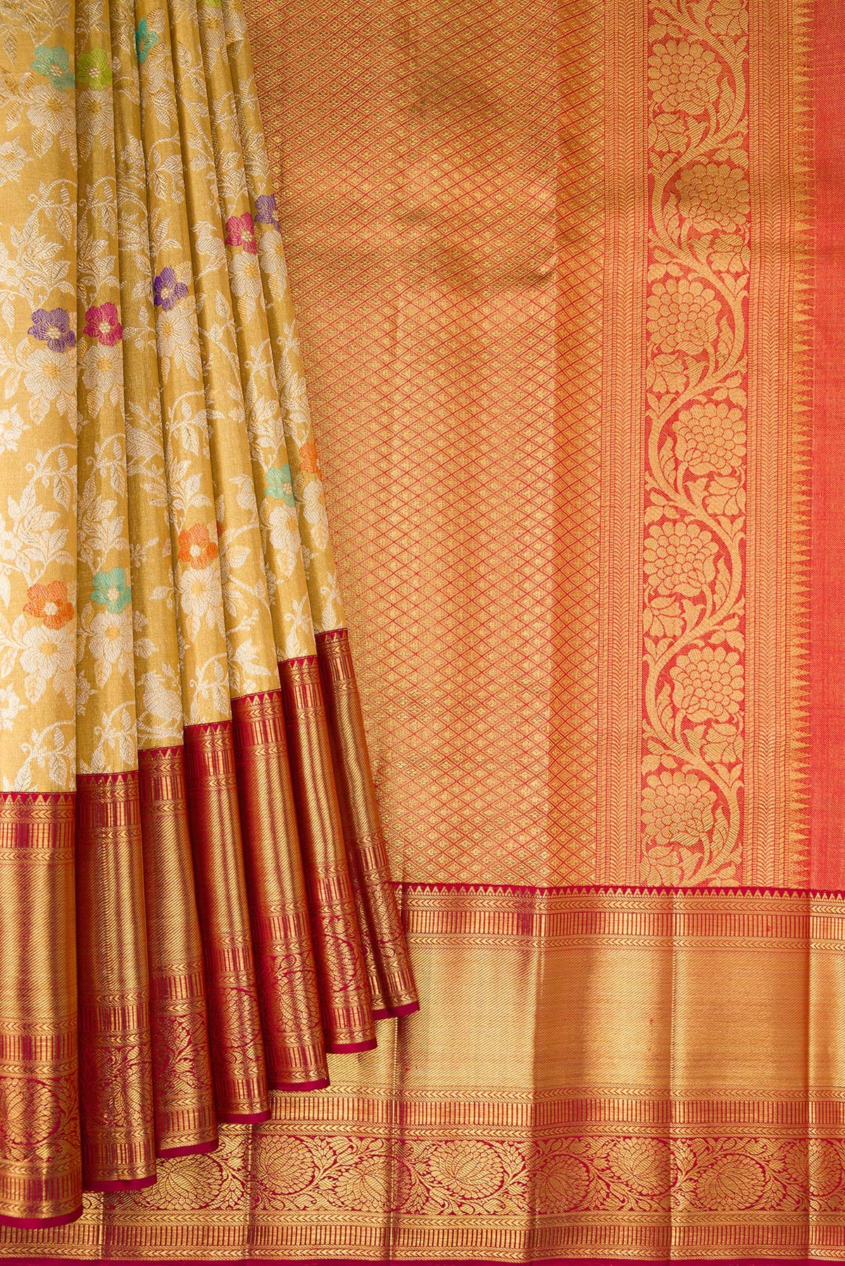 Pleats and pallu of Gold Dual Tone Kanjivaram Tissue Saree with Zari Brocade on the body and Zari Border. 