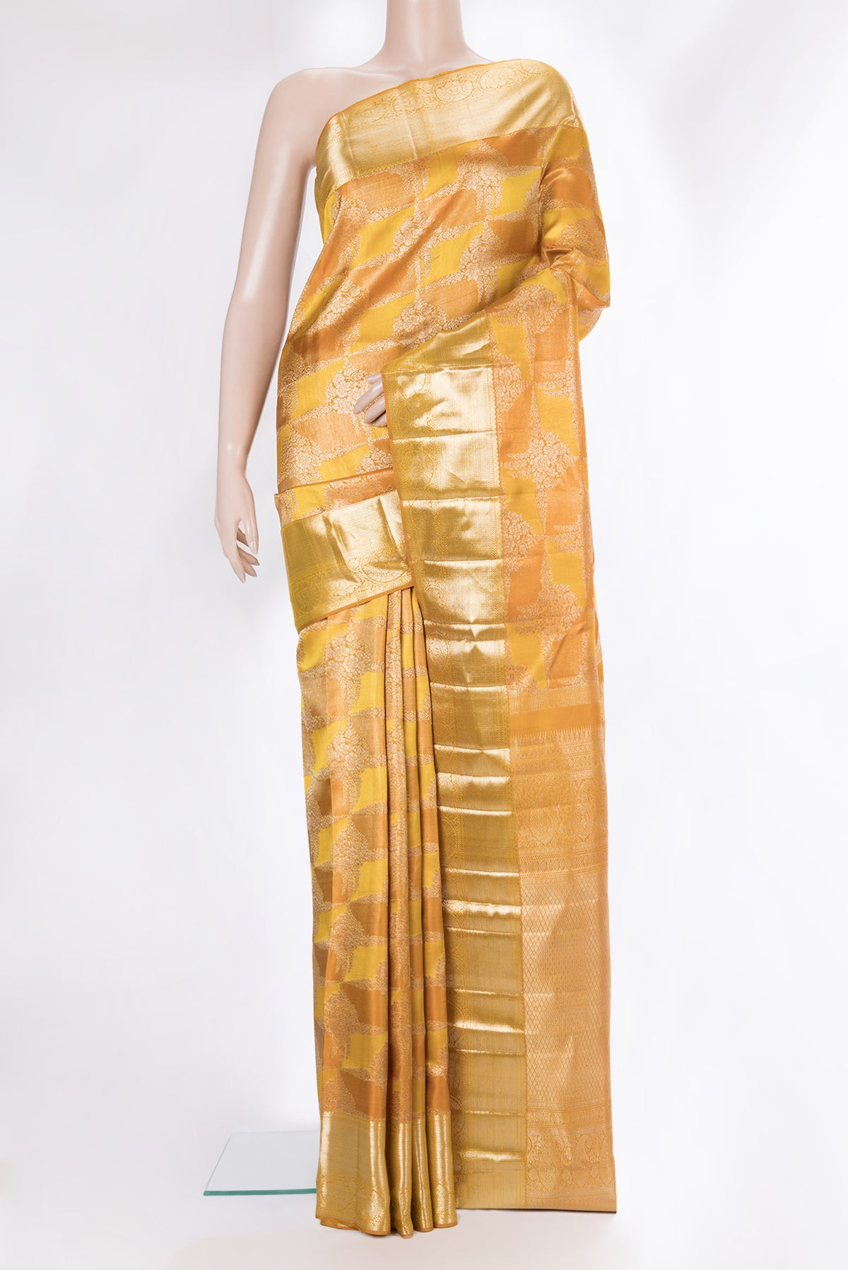 Pure Silk Mustard Dual Tone Kanjivaram Saree with Zari Brocade on the body and Zari Border.  displayed on a mannequin