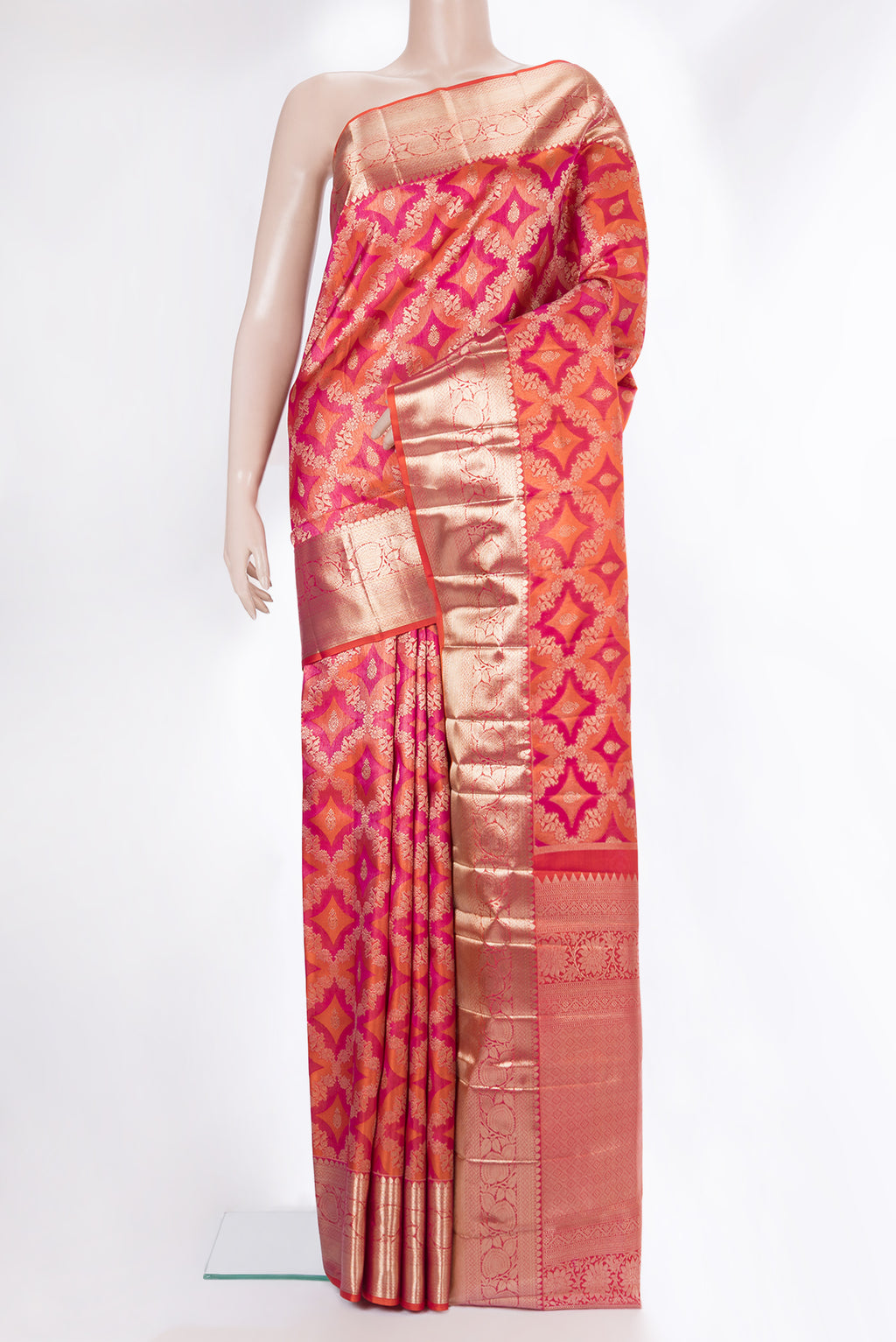 Pure Silk Orange Dual Tone Kanjivaram Saree with Zari Brocade on the body and Zari Border.  displayed on a mannequin