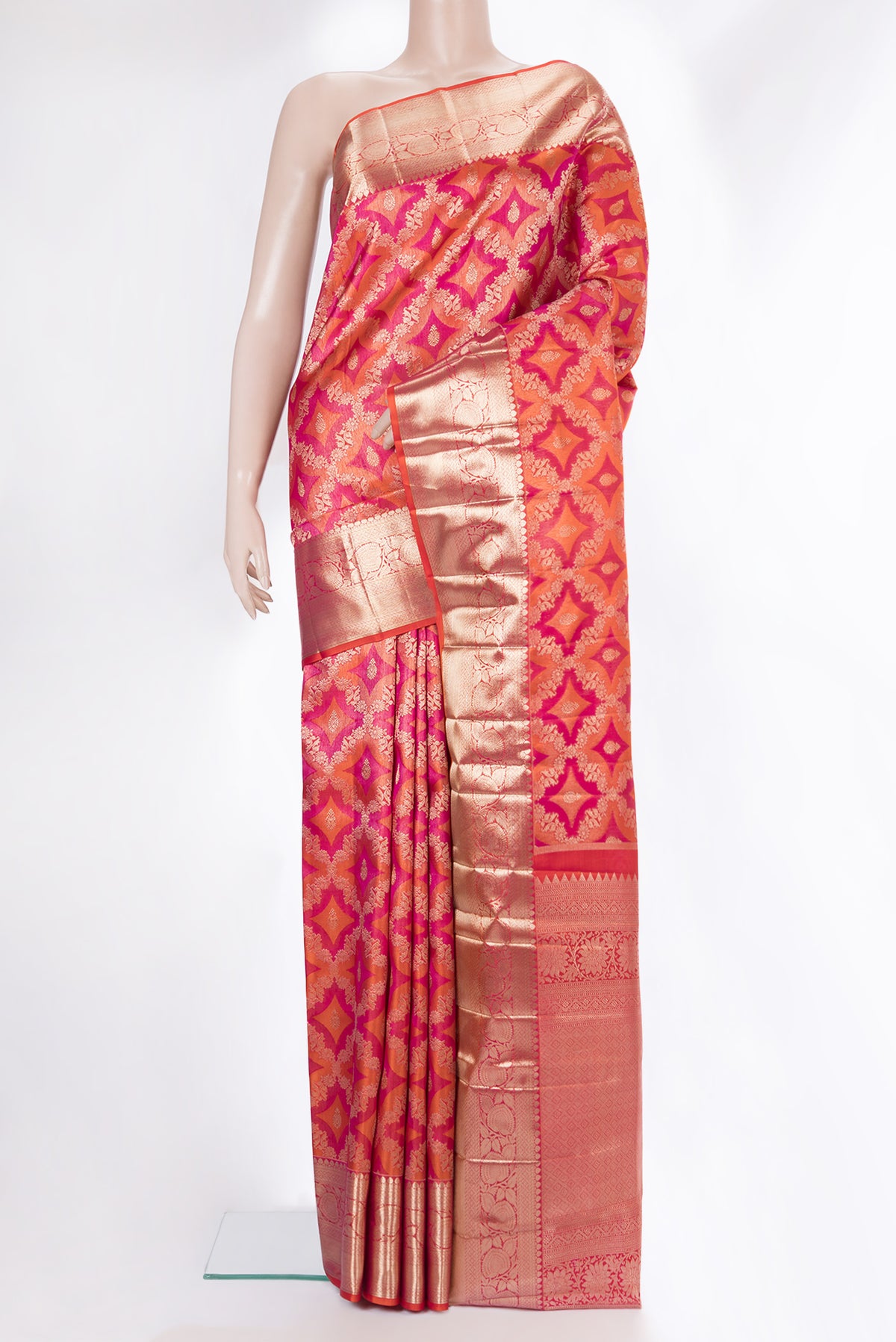 Pure Silk Orange Dual Tone Kanjivaram Saree with Zari Brocade on the body and Zari Border.  displayed on a mannequin