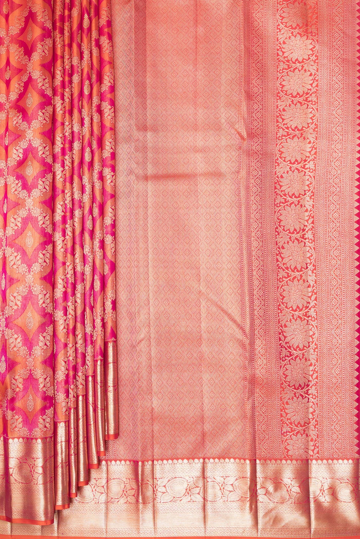 Pleats and pallu of Pure Silk Orange Dual Tone Kanjivaram Saree with Zari Brocade on the body and Zari Border. 