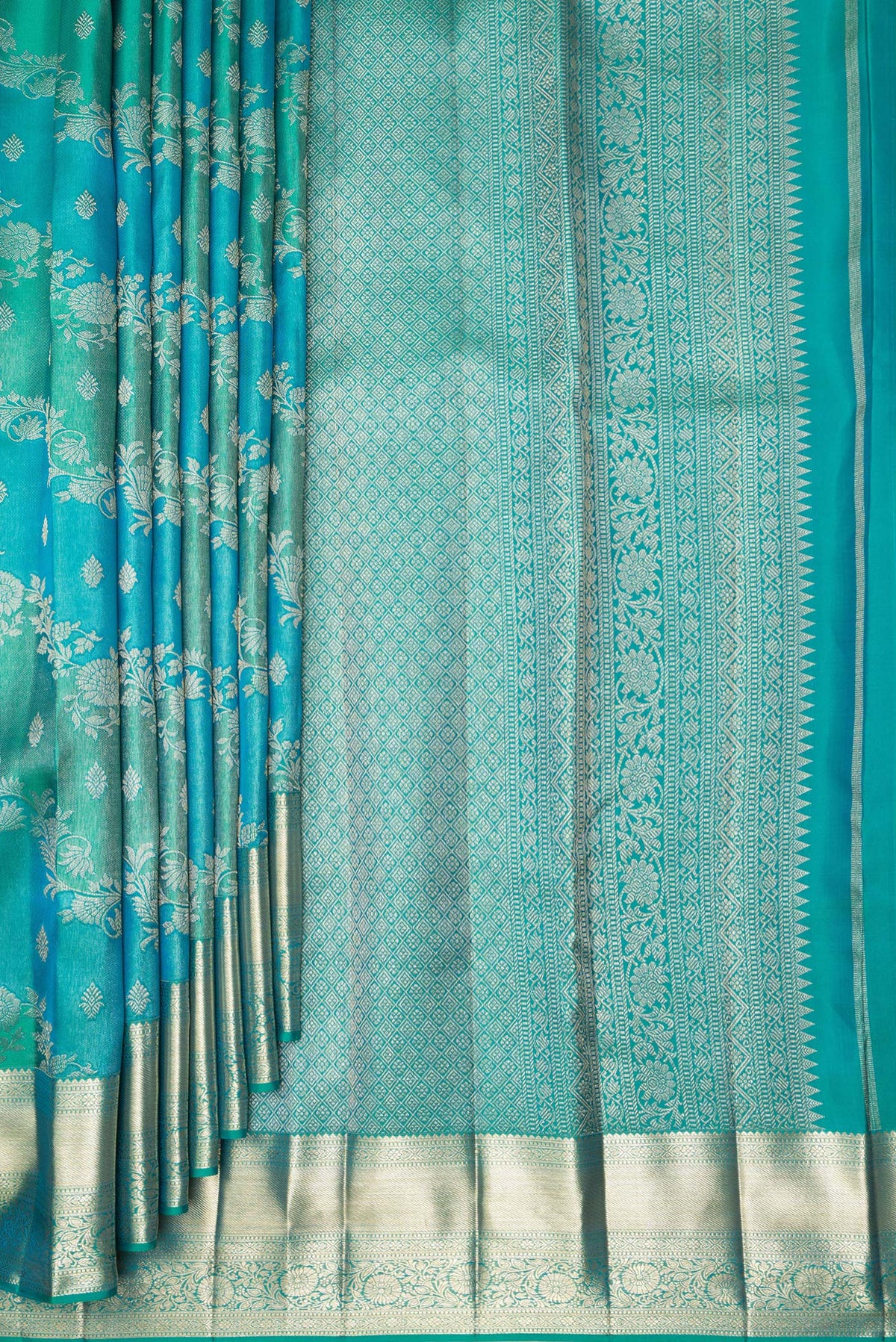 Pleats and pallu of Pure Silk Sea Green and Sky Blue Color Kanjivaram Saree with Zari Brocade on the body and Fancy Border. 