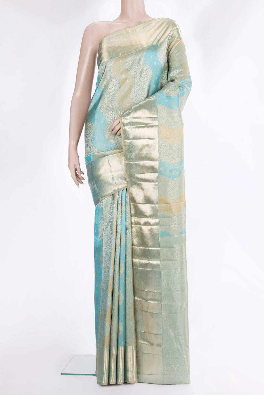 Pure Silk Sky Blue and Gold Color Kanjivaram Saree with Zari Brocade on the body and Zari Border.  displayed on a mannequin
