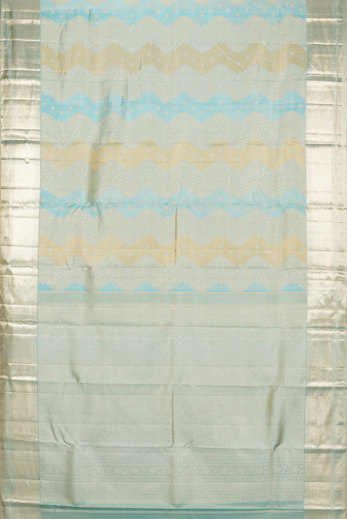 Flat view of Pure Silk Sky Blue and Gold Color Kanjivaram Saree with Zari Brocade on the body and Zari Border. 