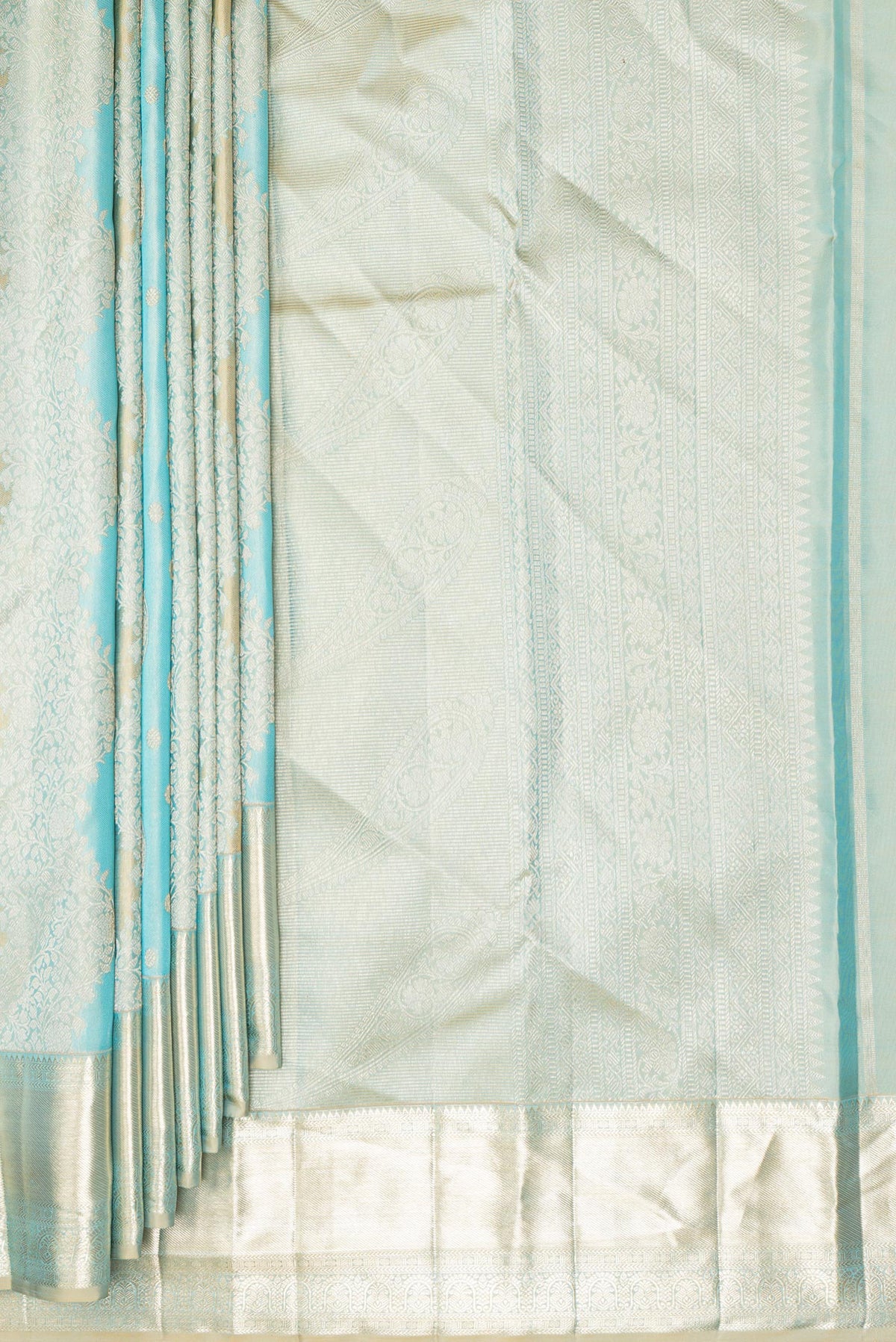 Pleats and pallu of Pure Silk Sky Blue and Gold Color Kanjivaram Saree with Zari Brocade on the body and Zari Border. 