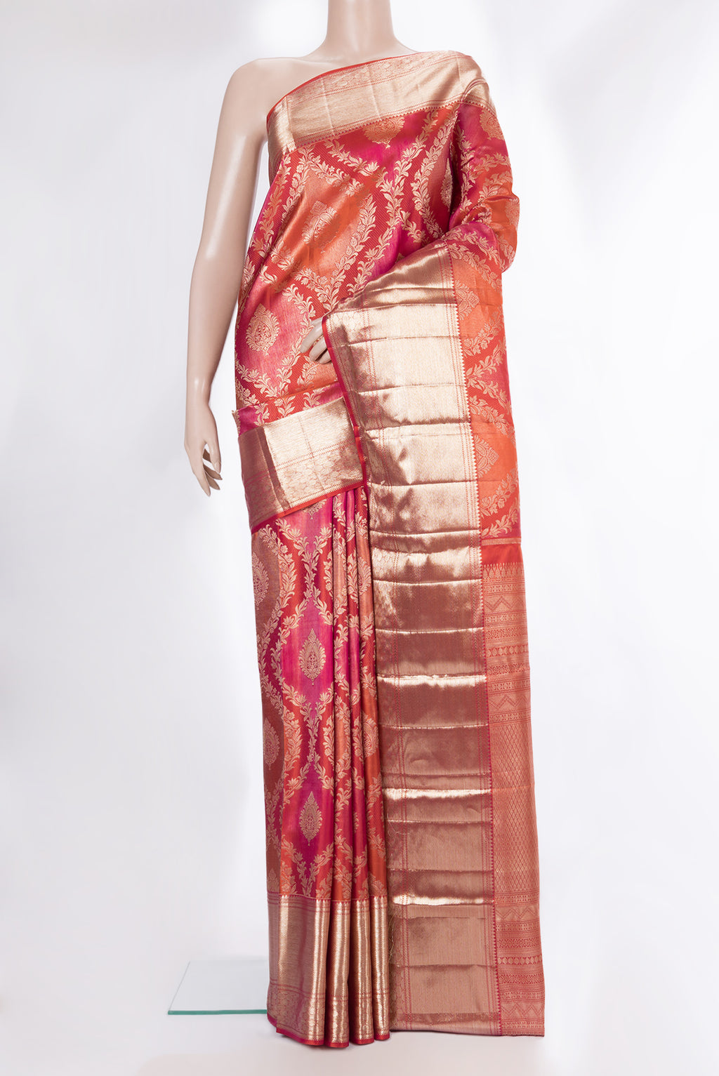 Pure Silk Orange Dual Tone Kanjivaram Saree with Zari Brocade on the body and Zari Border.  displayed on a mannequin