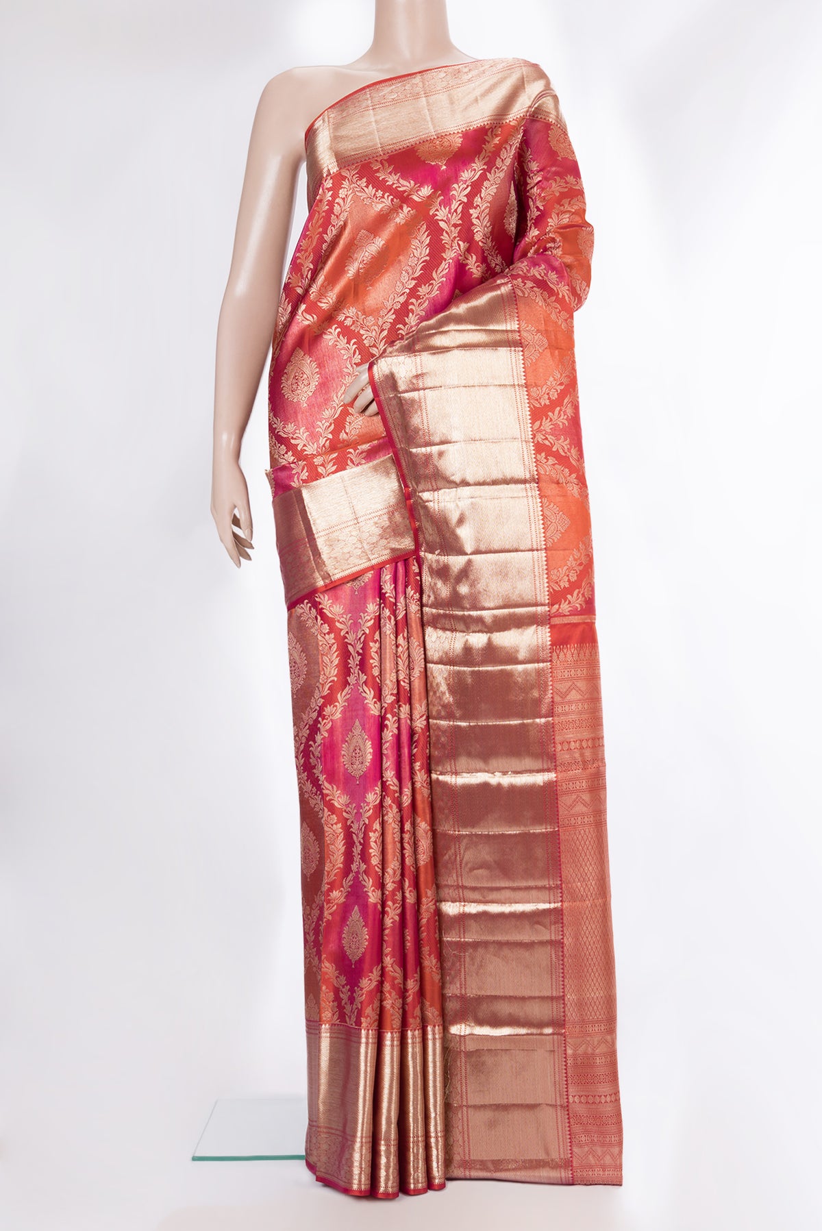 Pure Silk Orange Dual Tone Kanjivaram Saree with Zari Brocade on the body and Zari Border.  displayed on a mannequin
