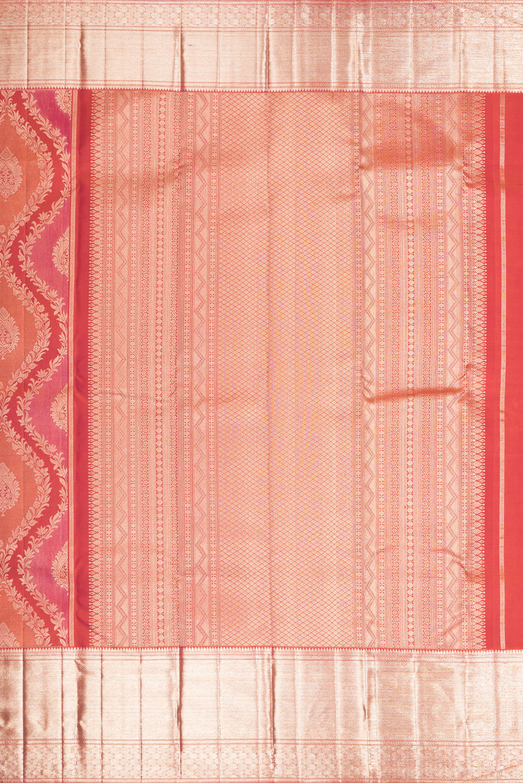 Close up image of the pallu of Pure Silk Orange Dual Tone Kanjivaram Saree with Zari Brocade on the body and Zari Border. 