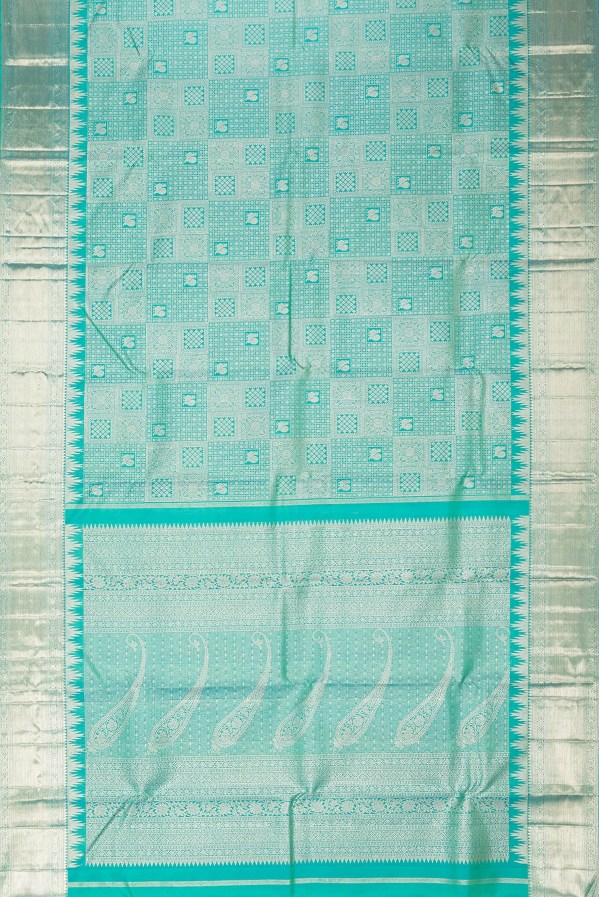 Flat view of Pure Silk Sea Green Dual Tone Kanjivaram Saree with Zari Brocade on the body and Zari Border. 