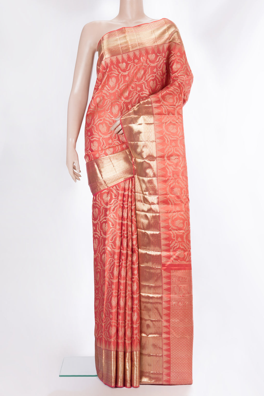 Pure Silk Peach Dual Tone Kanjivaram Saree with Zari Brocade on the body and Fancy Border.  displayed on a mannequin