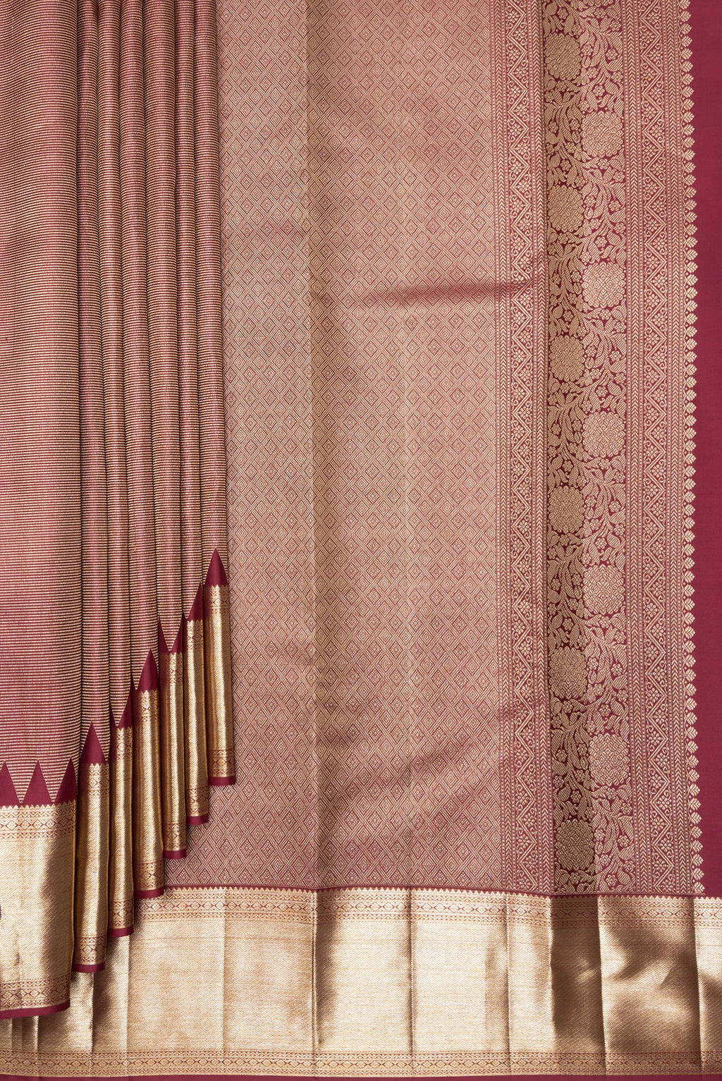 Pleats and pallu of Pure Silk Maroon Kanjivaram Saree with Zari Brocade on the body and Fancy Border. 