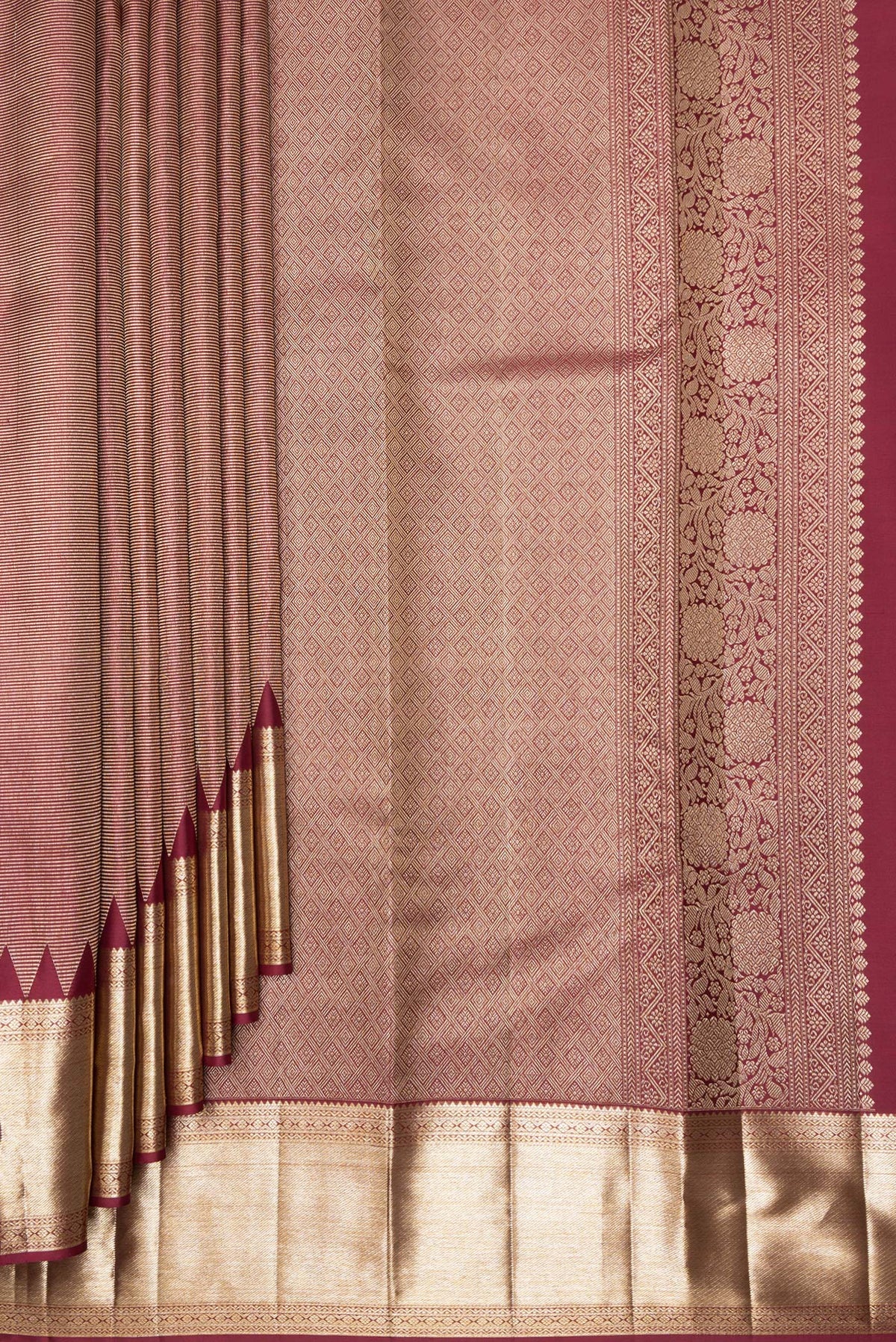 Pleats and pallu of Pure Silk Maroon Kanjivaram Saree with Zari Brocade on the body and Fancy Border. 