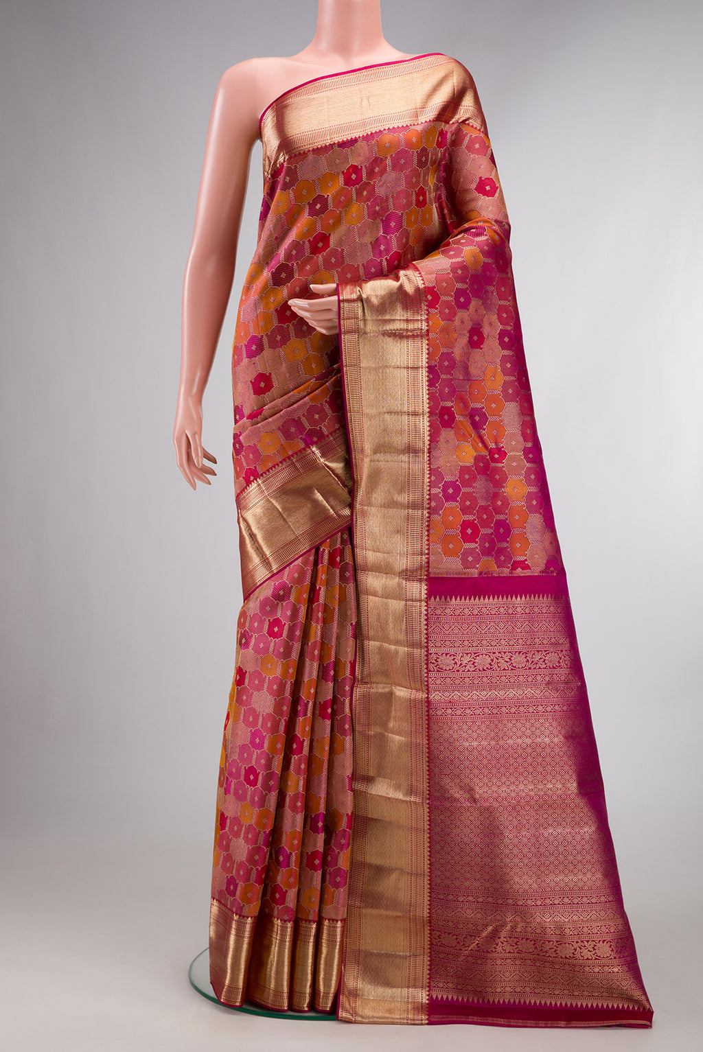 Pure Silk Magenta Dual Tone Kanjivaram Saree with Zari Brocade on the body and Zari Border.  displayed on a mannequin