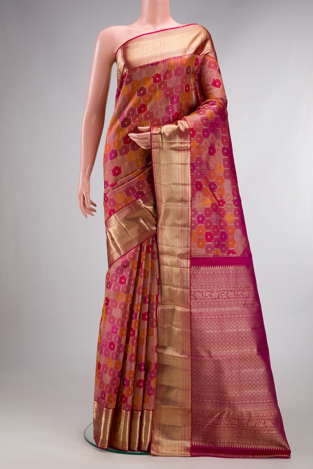 Pure Silk Magenta Dual Tone Kanjivaram Saree with Zari Brocade on the body and Zari Border.  displayed on a mannequin