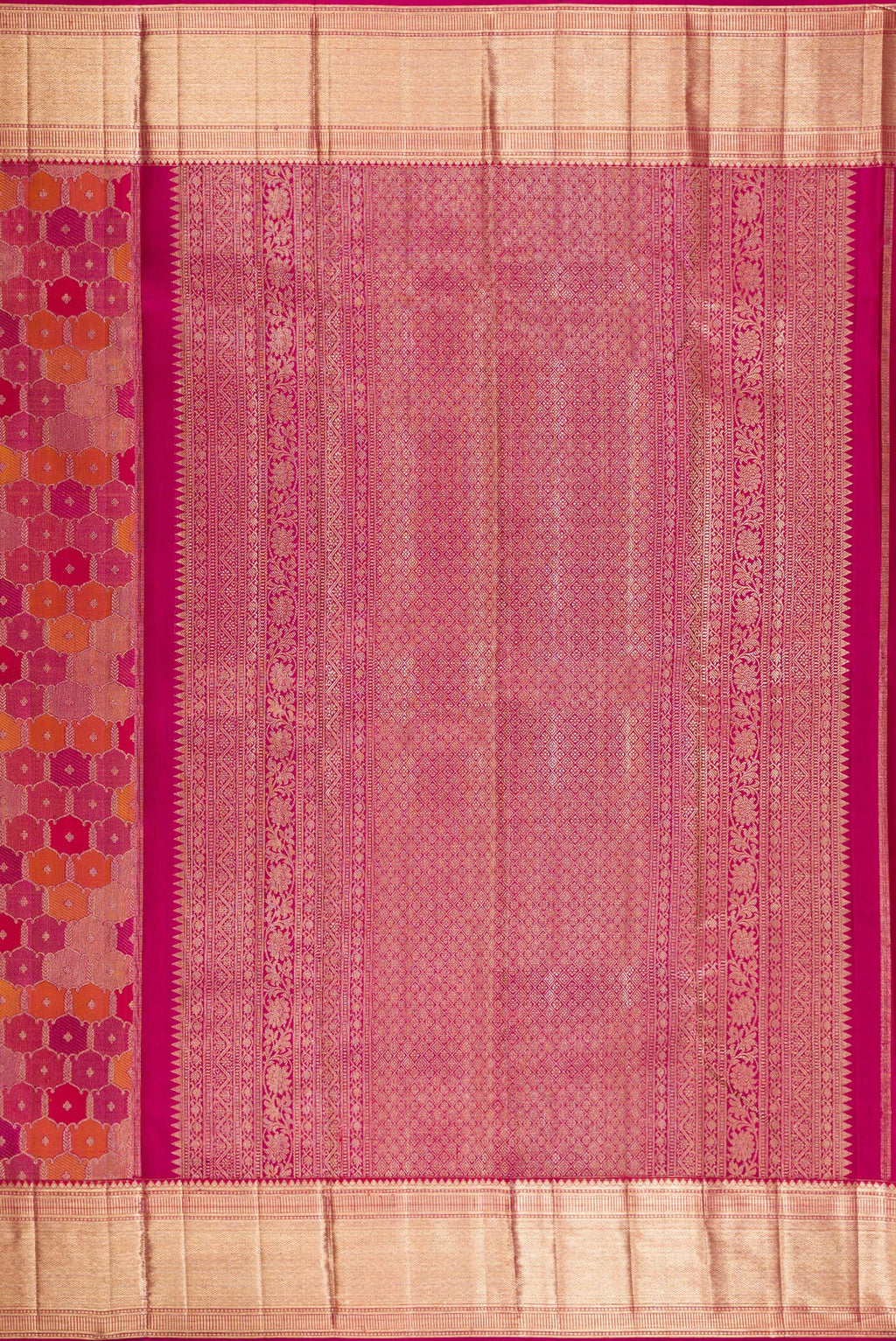 Close up image of the pallu of Pure Silk Magenta Dual Tone Kanjivaram Saree with Zari Brocade on the body and Zari Border. 