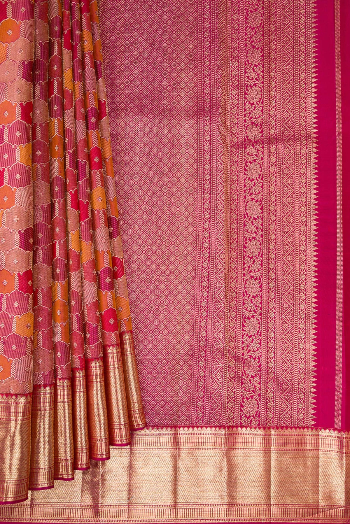 Pleats and pallu of Pure Silk Magenta Dual Tone Kanjivaram Saree with Zari Brocade on the body and Zari Border. 