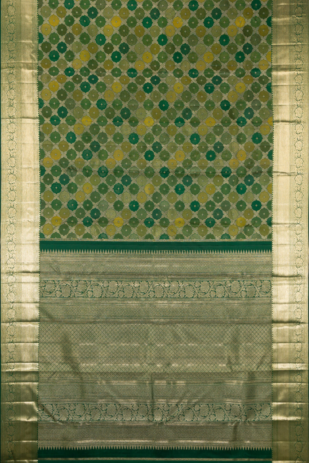Flat view of Pure Silk Bottle Green Kanjivaram Saree with Zari Brocade on the body and Zari Border. 