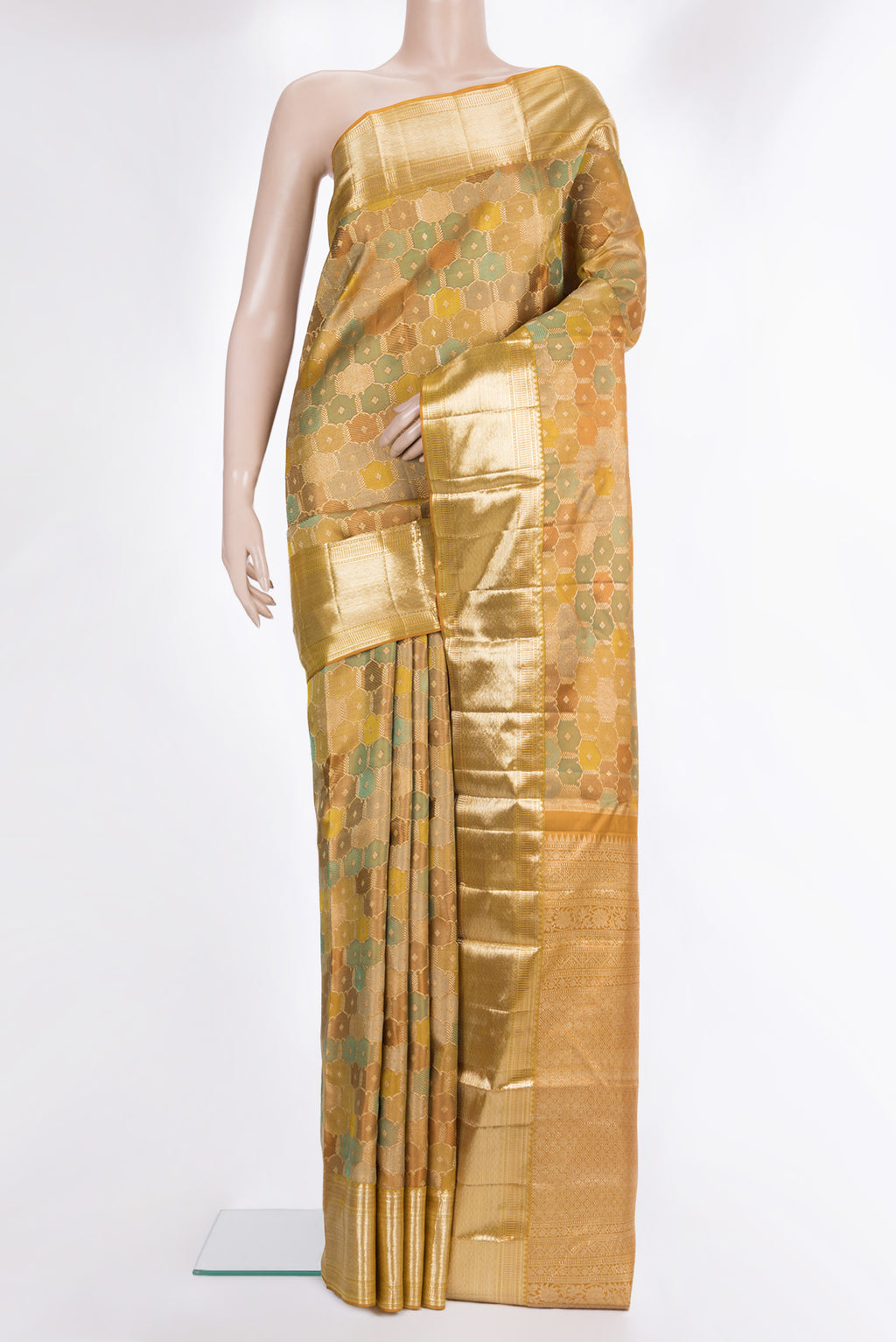 Pure Silk Mustard Kanjivaram Saree with Zari Brocade on the body and Zari Border.  displayed on a mannequin