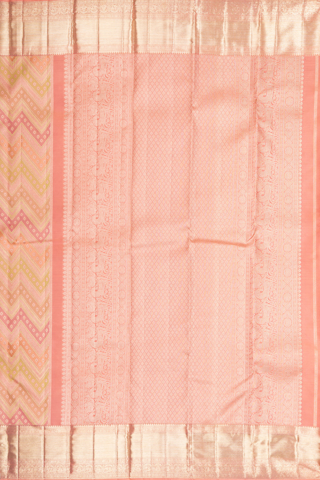 Close up image of the pallu of Pure Silk Peach Dual Tone Kanjivaram Saree with Zari Brocade on the body and Zari Border. 