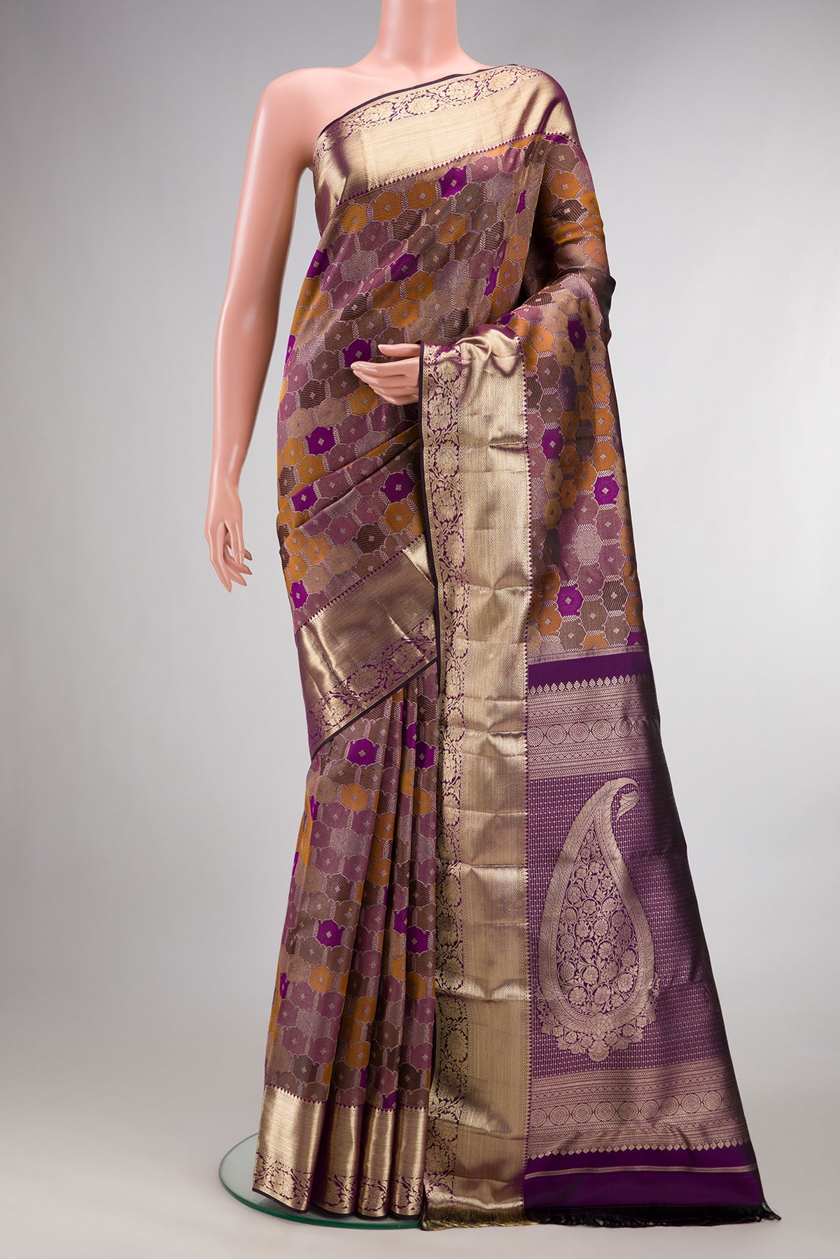 Pure Silk Purple Dual Tone Kanjivaram Saree with Zari Brocade on the body and Zari Border.  displayed on a mannequin