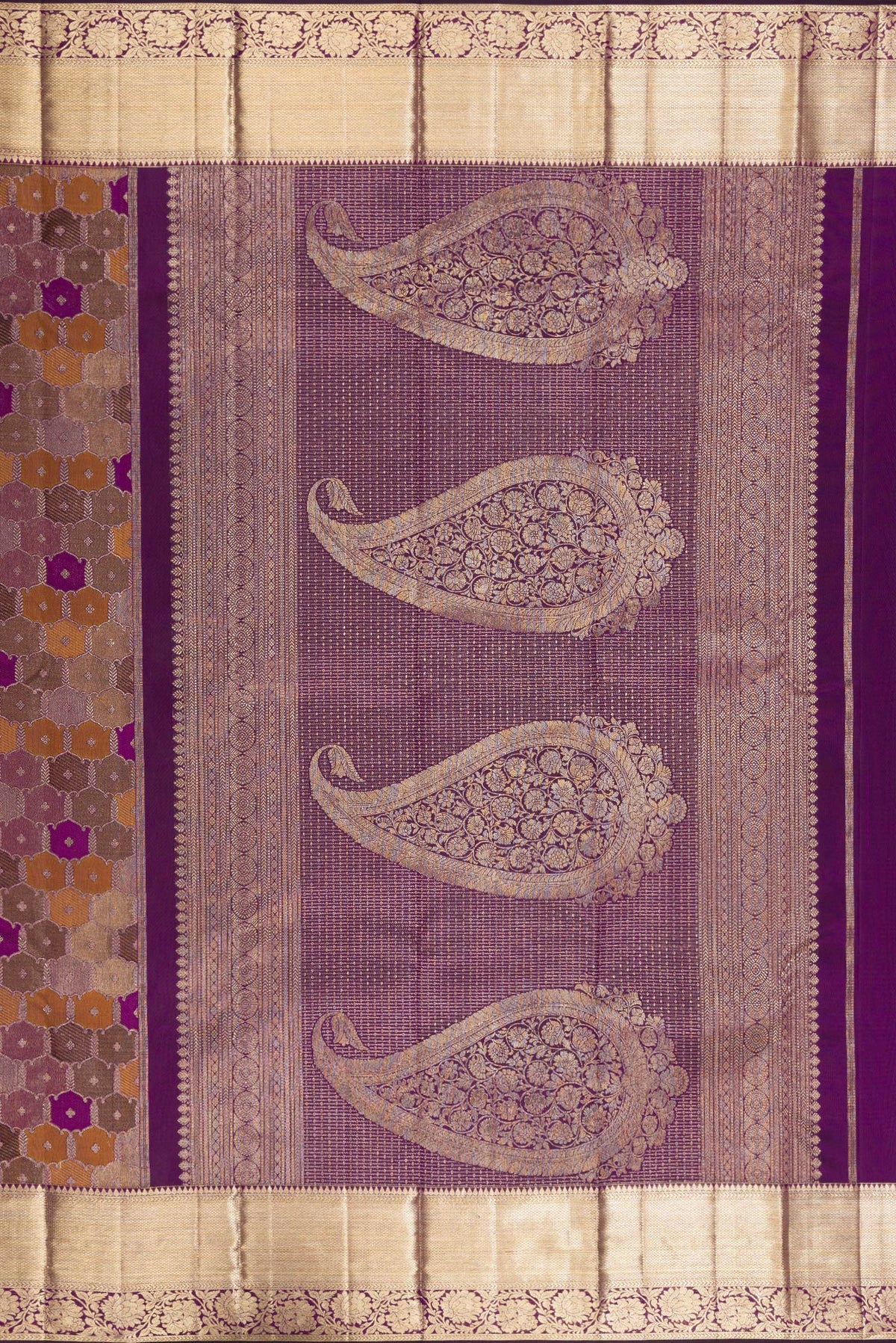 Close up image of the pallu of Pure Silk Purple Dual Tone Kanjivaram Saree with Zari Brocade on the body and Zari Border. 