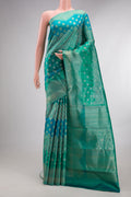 Pure Silk Blue and Sea Green Color Kanjivaram Saree with Zari Brocade on the body and Fancy Border.  displayed on a mannequin