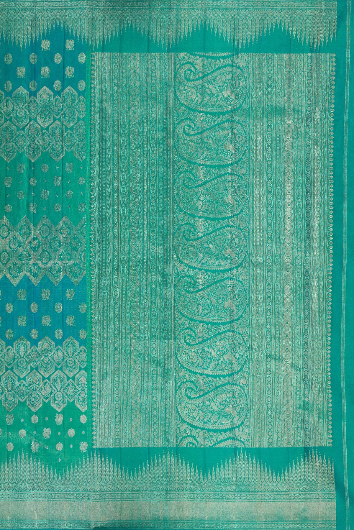 Close up image of the pallu of Pure Silk Blue and Sea Green Color Kanjivaram Saree with Zari Brocade on the body and Fancy Border. 