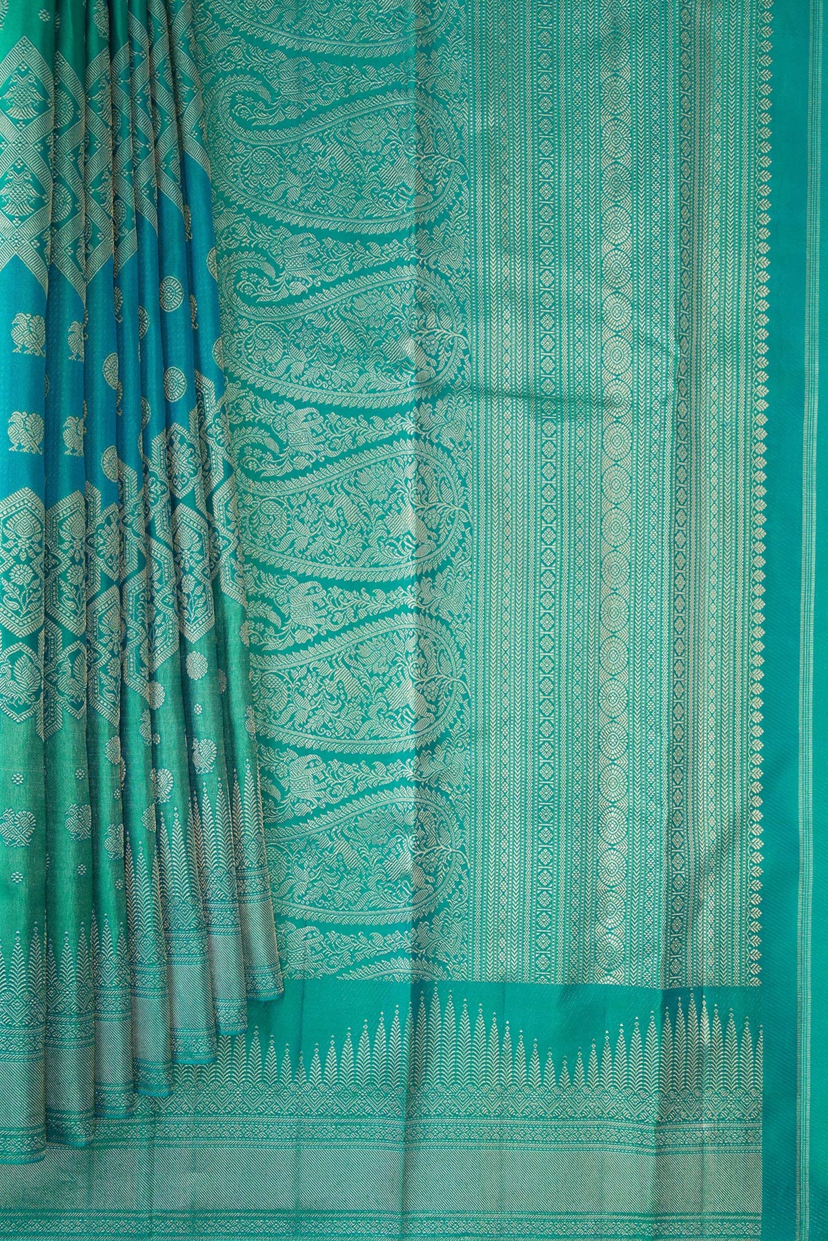 Pleats and pallu of Pure Silk Blue and Sea Green Color Kanjivaram Saree with Zari Brocade on the body and Fancy Border. 