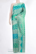 Pure Silk Sea Green Dual Tone Kanjivaram Saree with Zari Brocade on the body and Fancy Border.  displayed on a mannequin