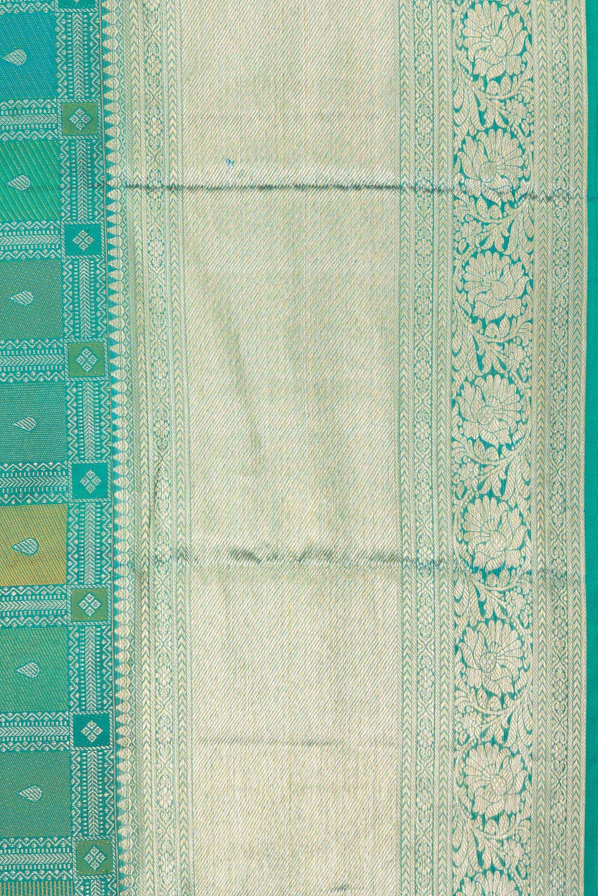 Border image of Pure Silk Peacock Blue Dual Tone Kanjivaram Saree with Zari Brocade on the body and Zari Border. 