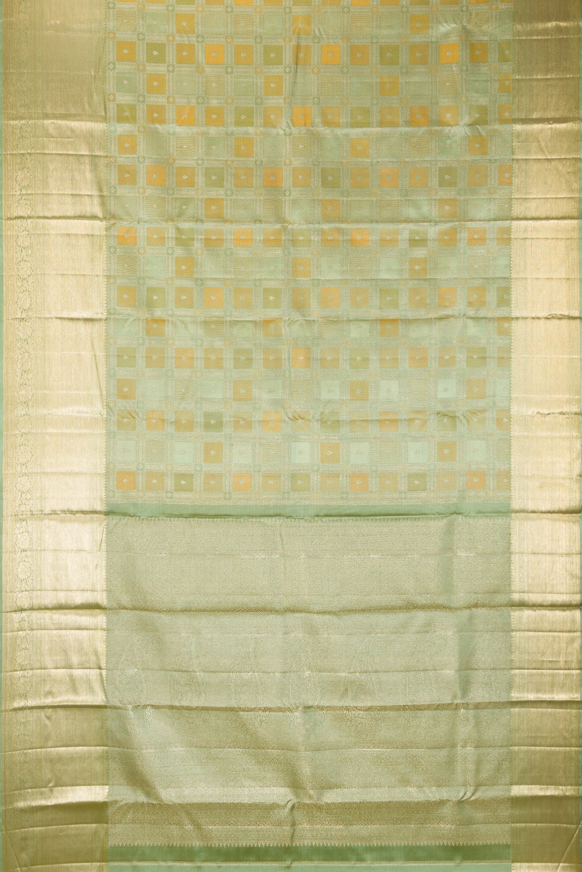 Flat view of Pure Silk Pista Green Kanjivaram Saree with Zari Brocade on the body and Zari Border. 