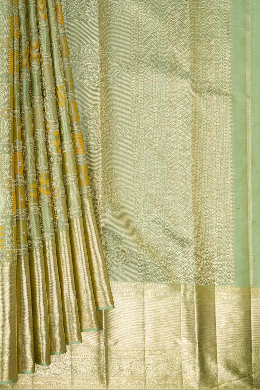 Pleats and pallu of Pure Silk Pista Green Kanjivaram Saree with Zari Brocade on the body and Zari Border. 