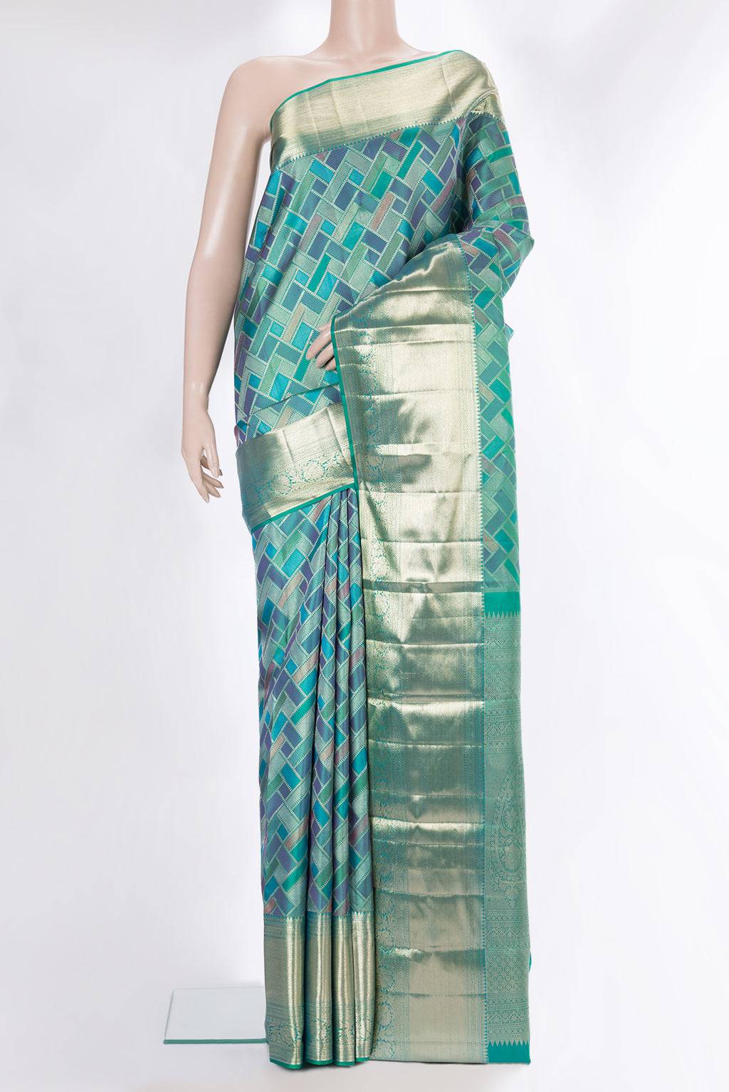 Pure Silk Sea Green Dual Tone Kanjivaram Saree with Zari Brocade on the body and Fancy Border.  displayed on a mannequin