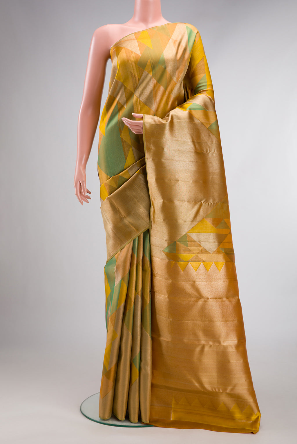Pure Silk Mustard Kanjivaram Saree with Zari Brocade on the body and Without Border.  displayed on a mannequin