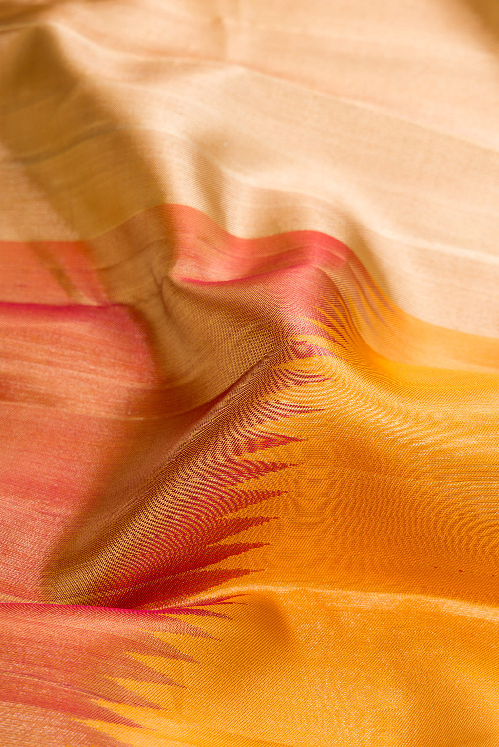 Close up of Pure Silk Multi Color Kanjivaram Saree with Zari Brocade on the body and Without Border.  displaying folds