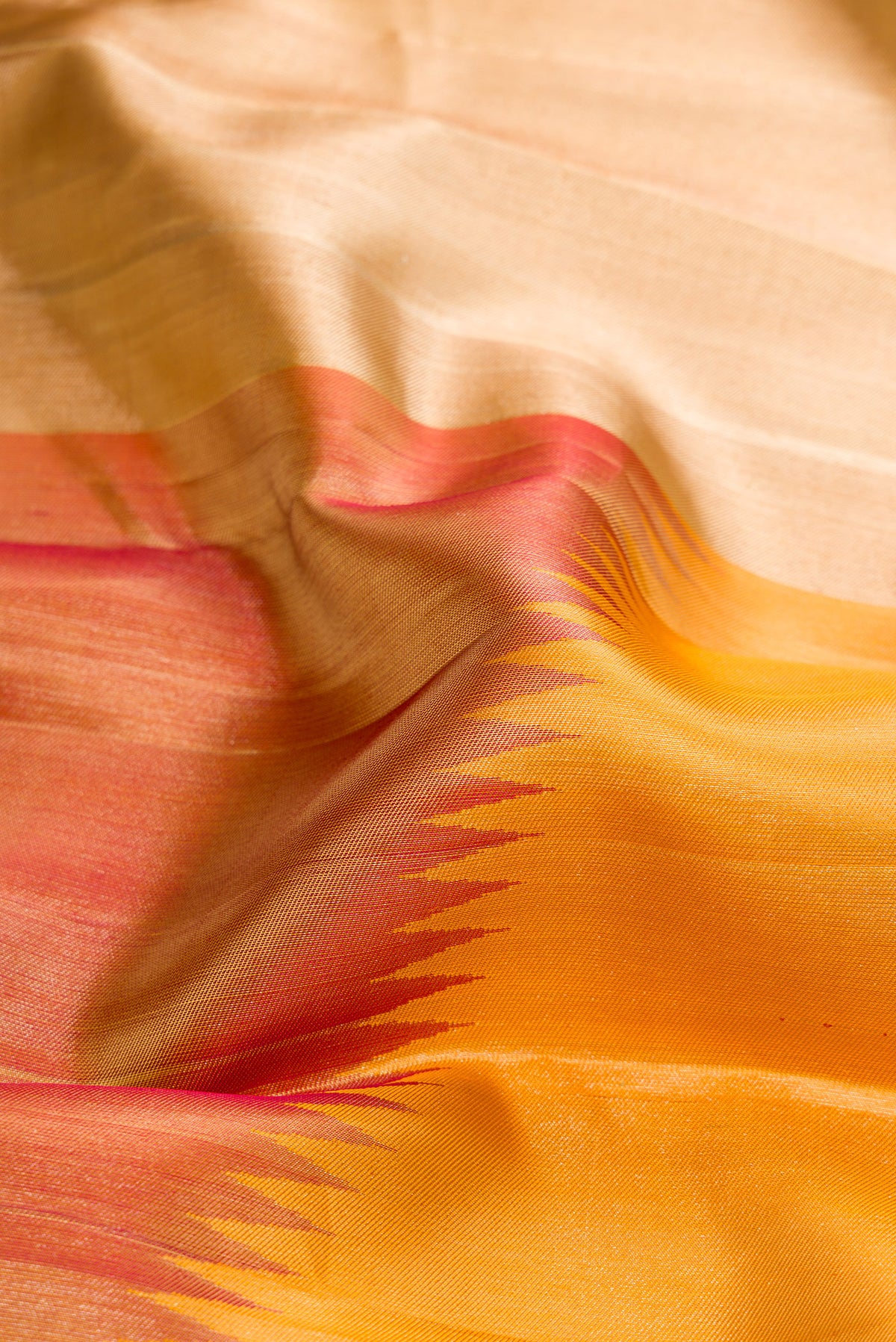 Close up of Pure Silk Multi Color Kanjivaram Saree with Zari Brocade on the body and Without Border.  displaying folds