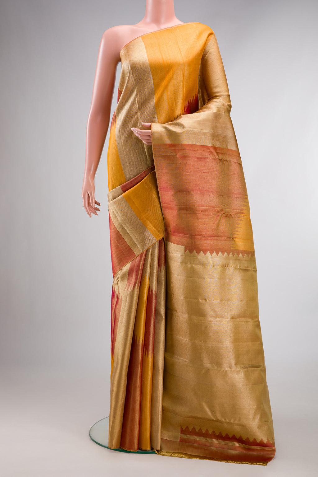 Pure Silk Multi Color Kanjivaram Saree with Zari Brocade on the body and Without Border.  displayed on a mannequin