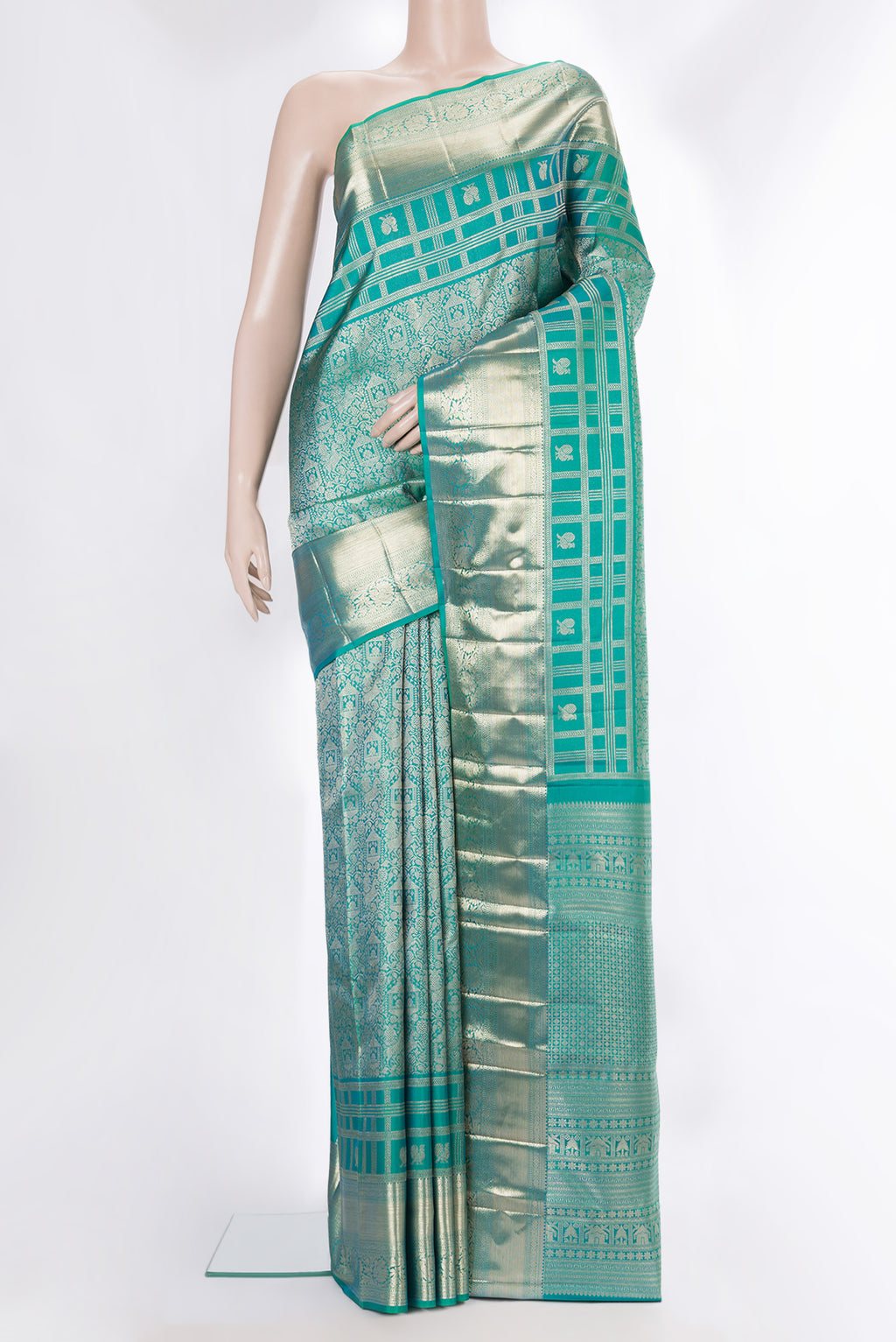 Pure Silk Sea Green Dual Tone Kanjivaram Saree with Zari Brocade on the body and Fancy Border.  displayed on a mannequin