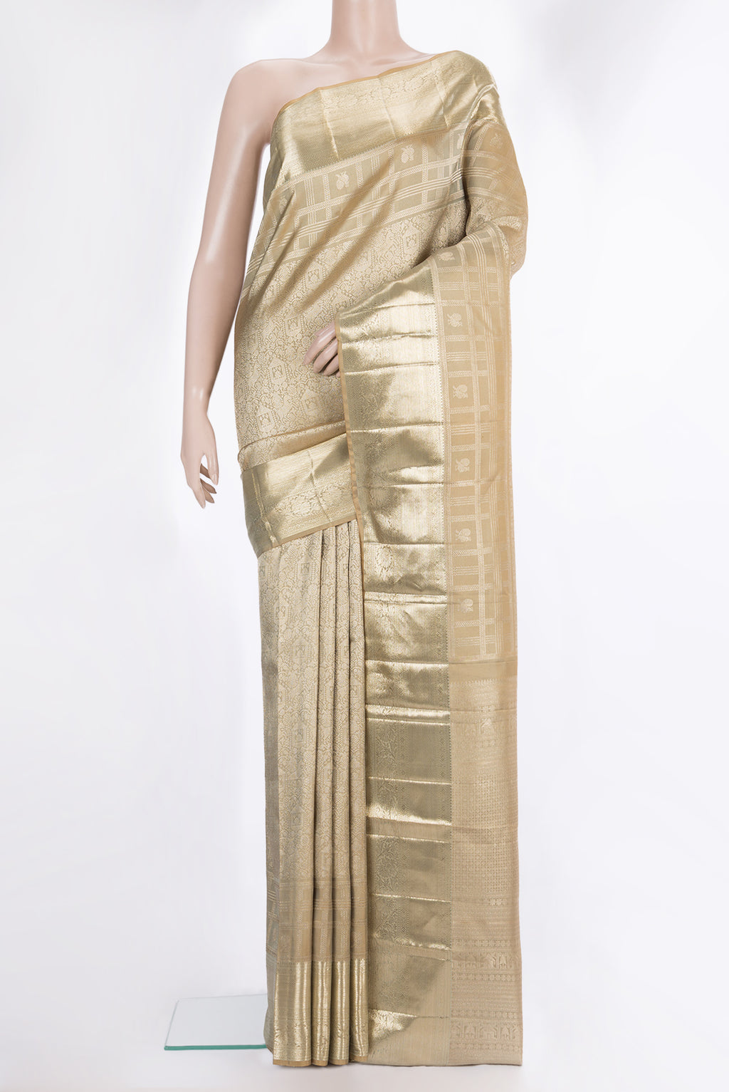 Pure Silk Beige Kanjivaram Saree with Zari Brocade on the body and Fancy Border.  displayed on a mannequin