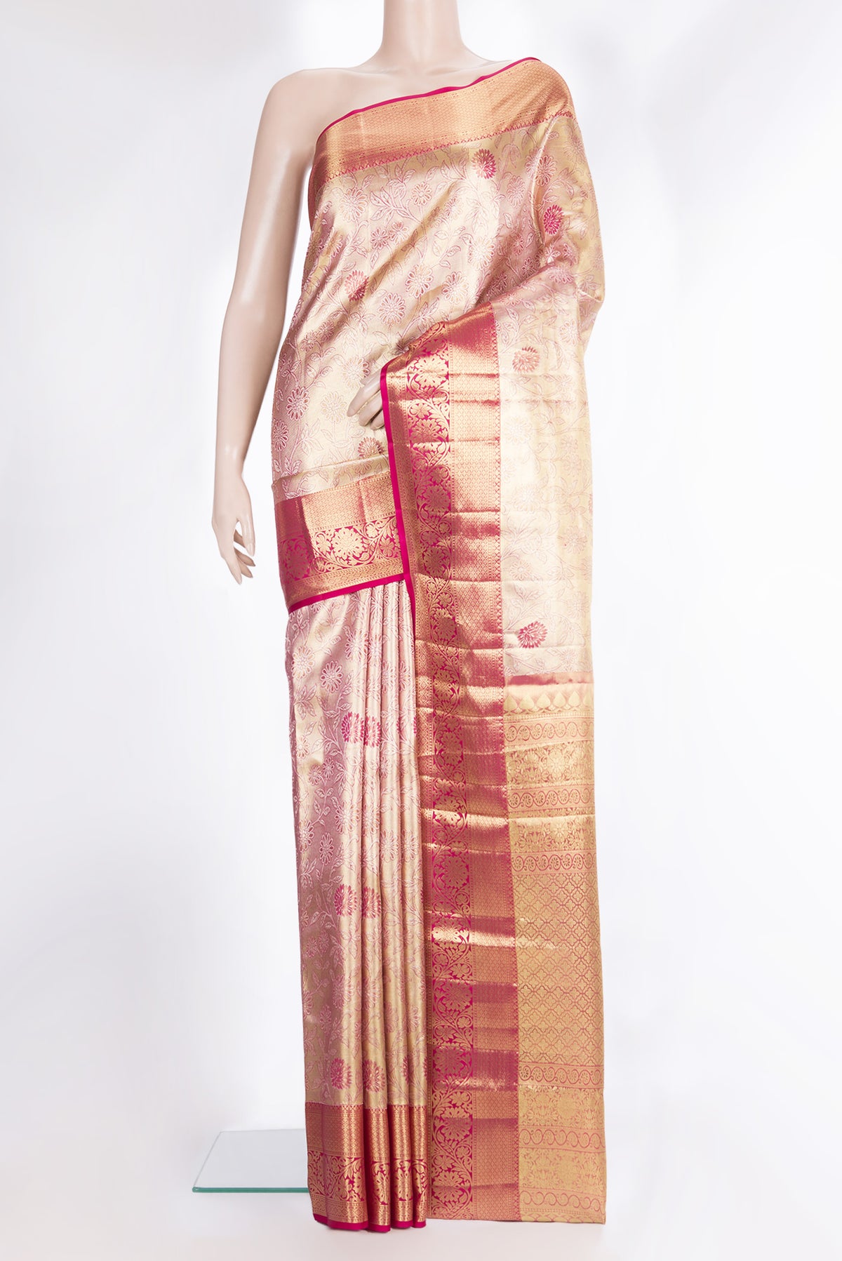 Pure Silk Gold Dual Tone Kanchipuram Tissue Saree with Zari Brocade on the body and Fancy Border.  displayed on a mannequin