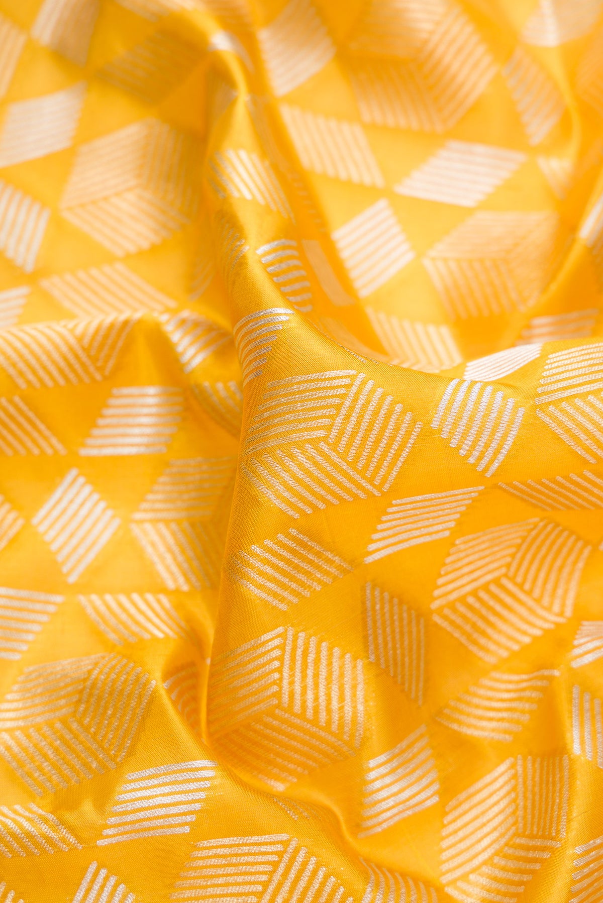 Close up of Pure Silk Yellow Banarasi Saree with Zari Brocade on the body and Zari Border.  displaying folds