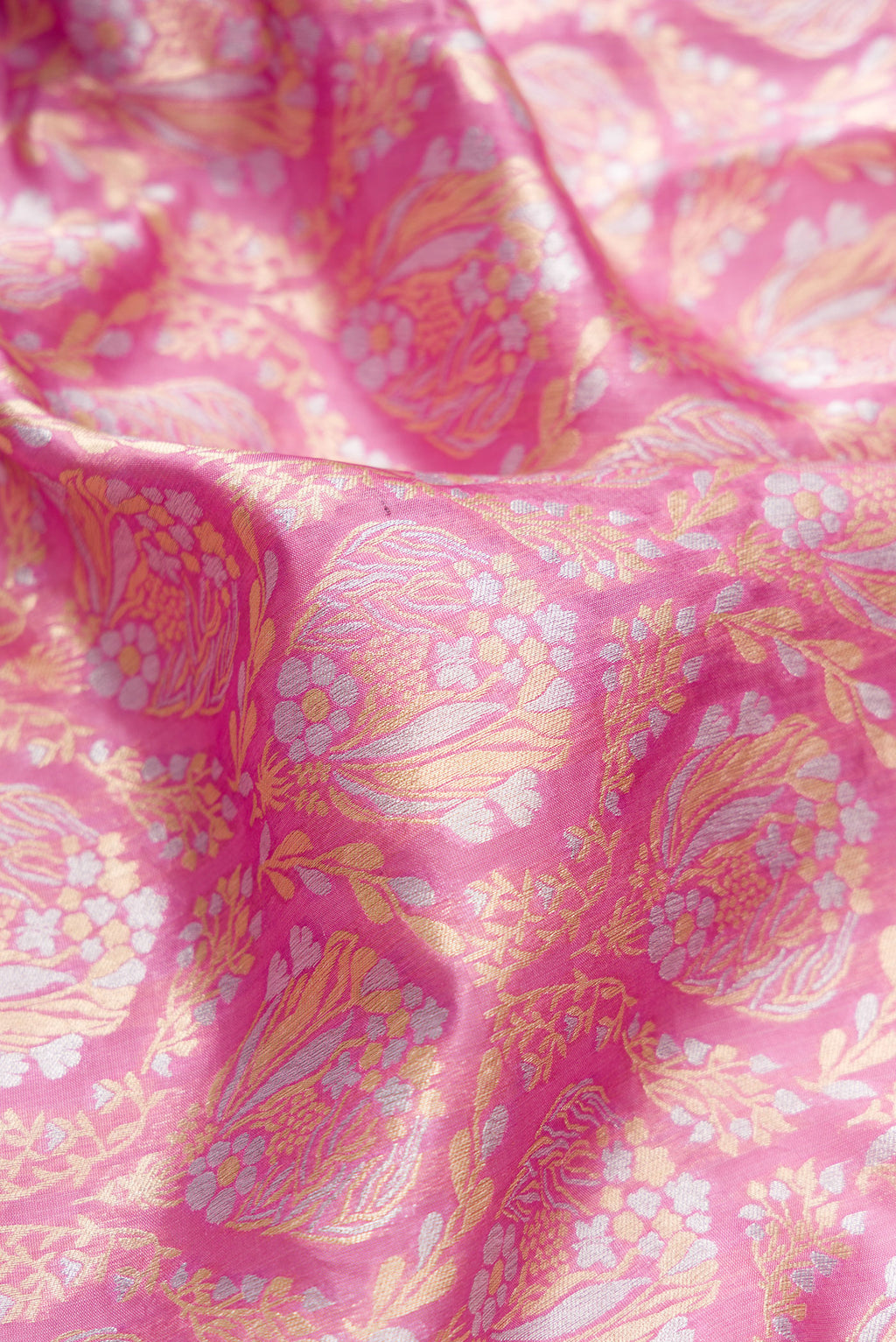 Close up of Pure Silk Pink Banarasi Saree with Zari Brocade on the body and Zari Border.  displaying folds