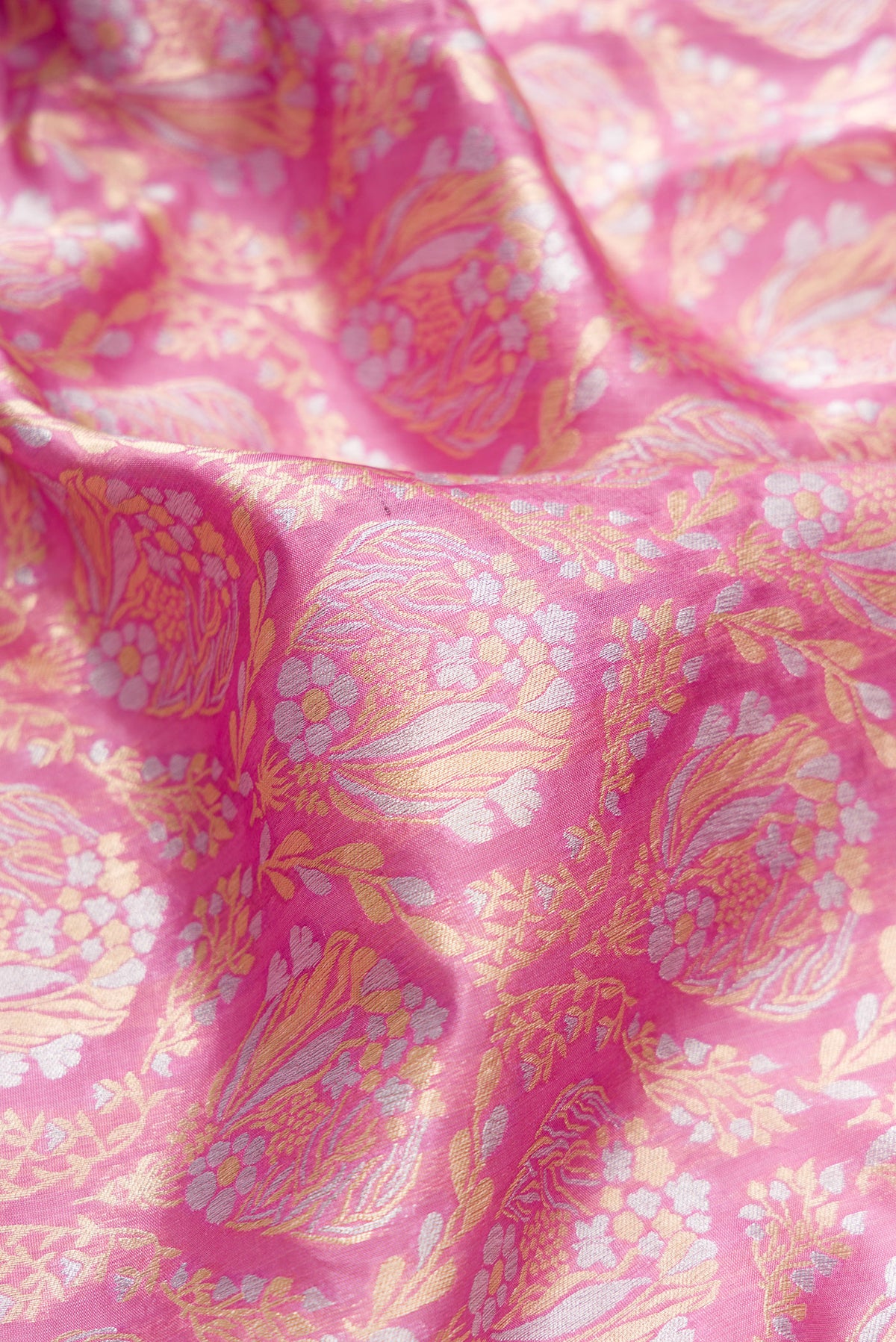 Close up of Pure Silk Pink Banarasi Saree with Zari Brocade on the body and Zari Border.  displaying folds