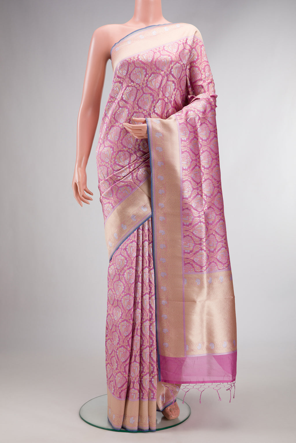 Pure Silk Pink Banarasi Saree with Zari Brocade on the body and Zari Border.  displayed on a mannequin