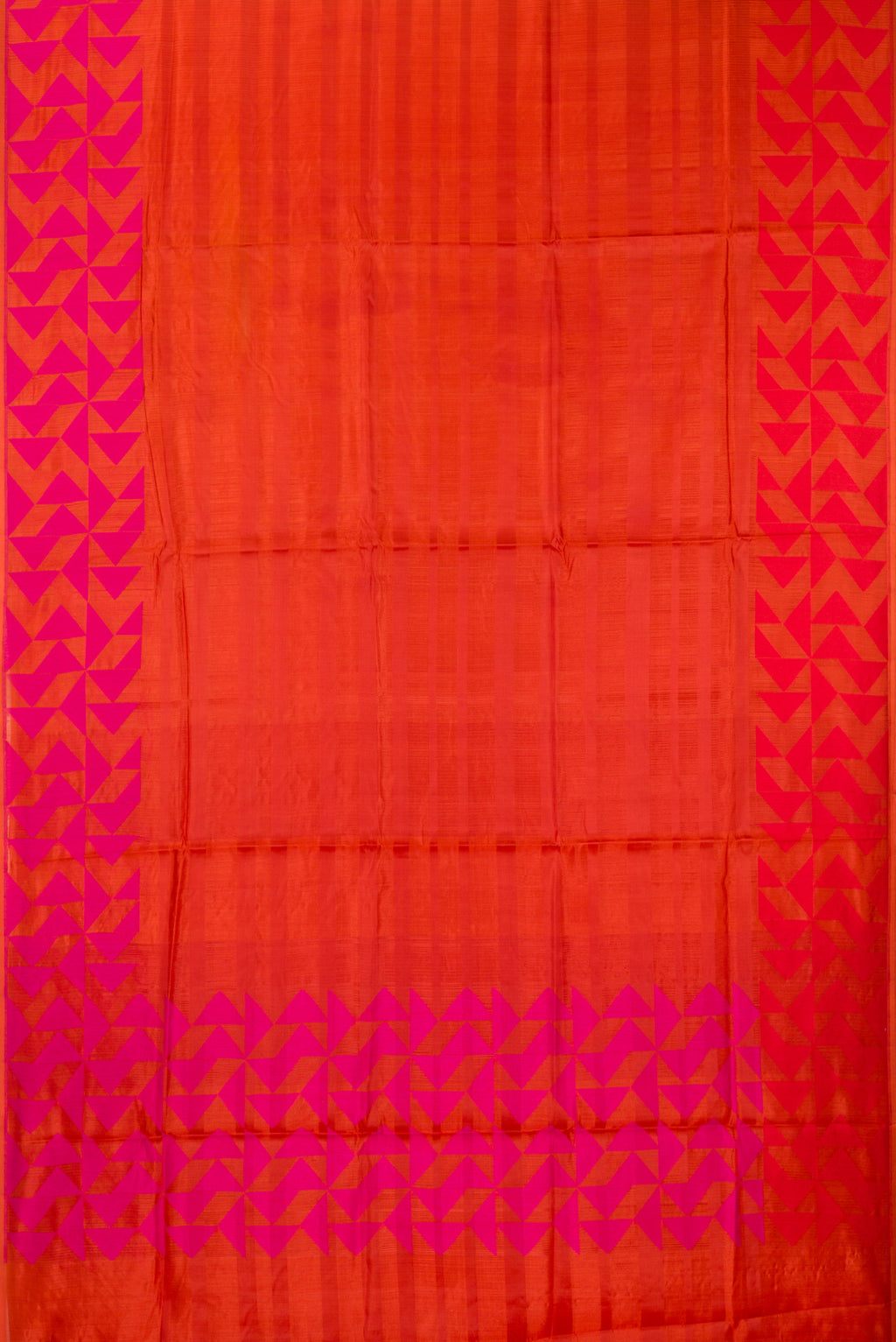 Flat view of Orange Tussar Saree with Stripes on the body and Fancy Border. 